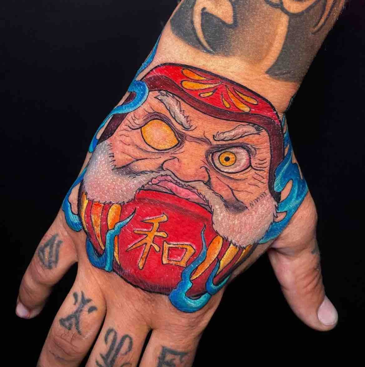 Daruma-japanese-egg-doll-folk-toy-colour-work-hand-tattoo.jpeg