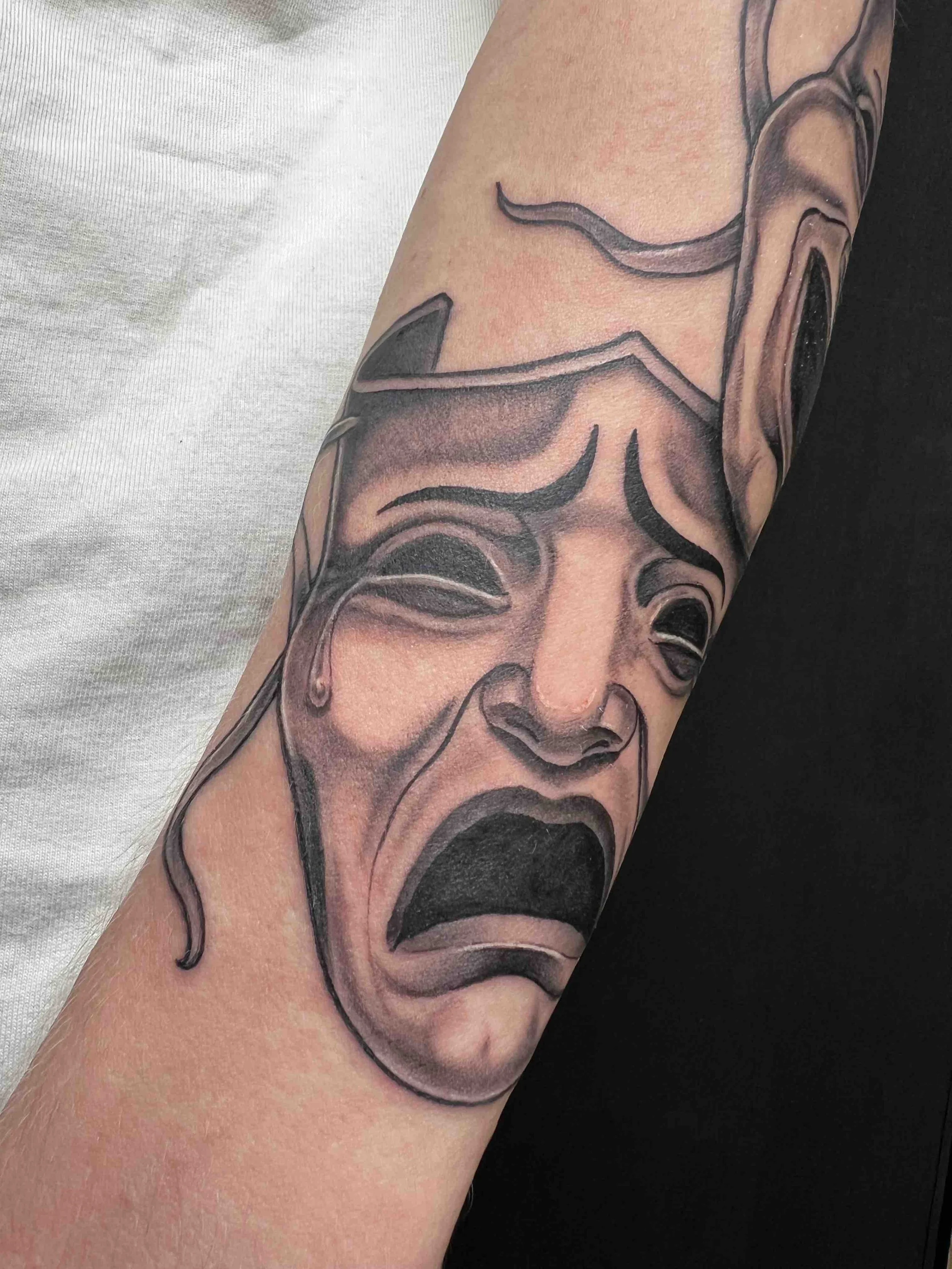 Tragedy-mask-shakespeare-blackandgrey-arm-tattoo.jpeg