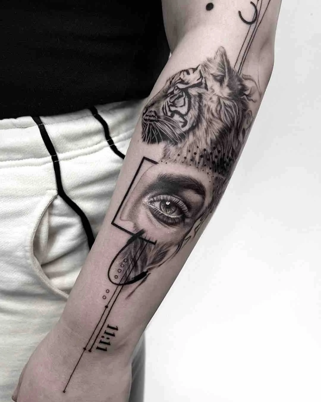 abstract-realism-blackwork-tattoo-arm-sleeve-tiger-eye.jpeg