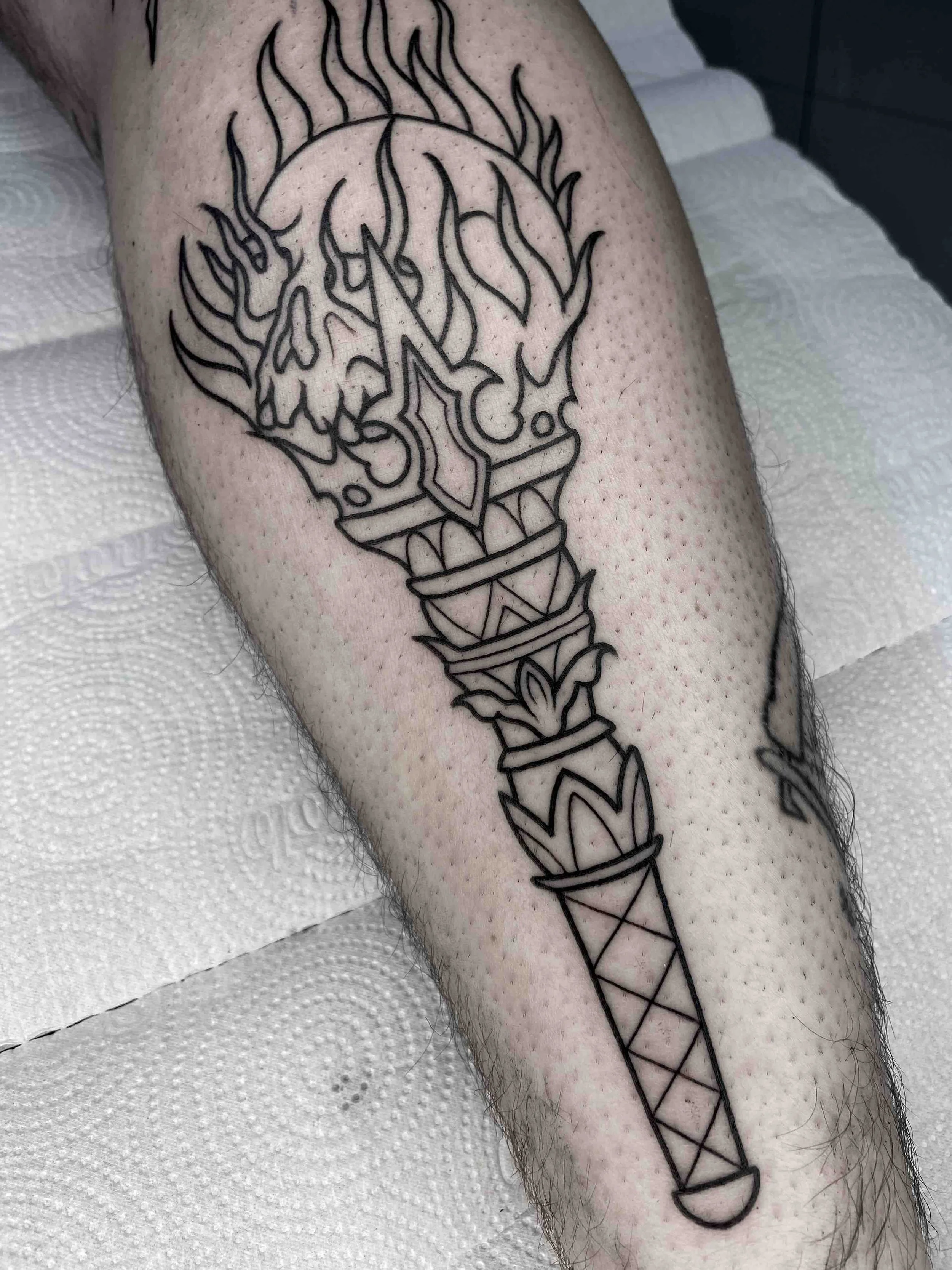 tattoo-outline-only-calf-tattoo-traditional-skull-and-torch.jpeg