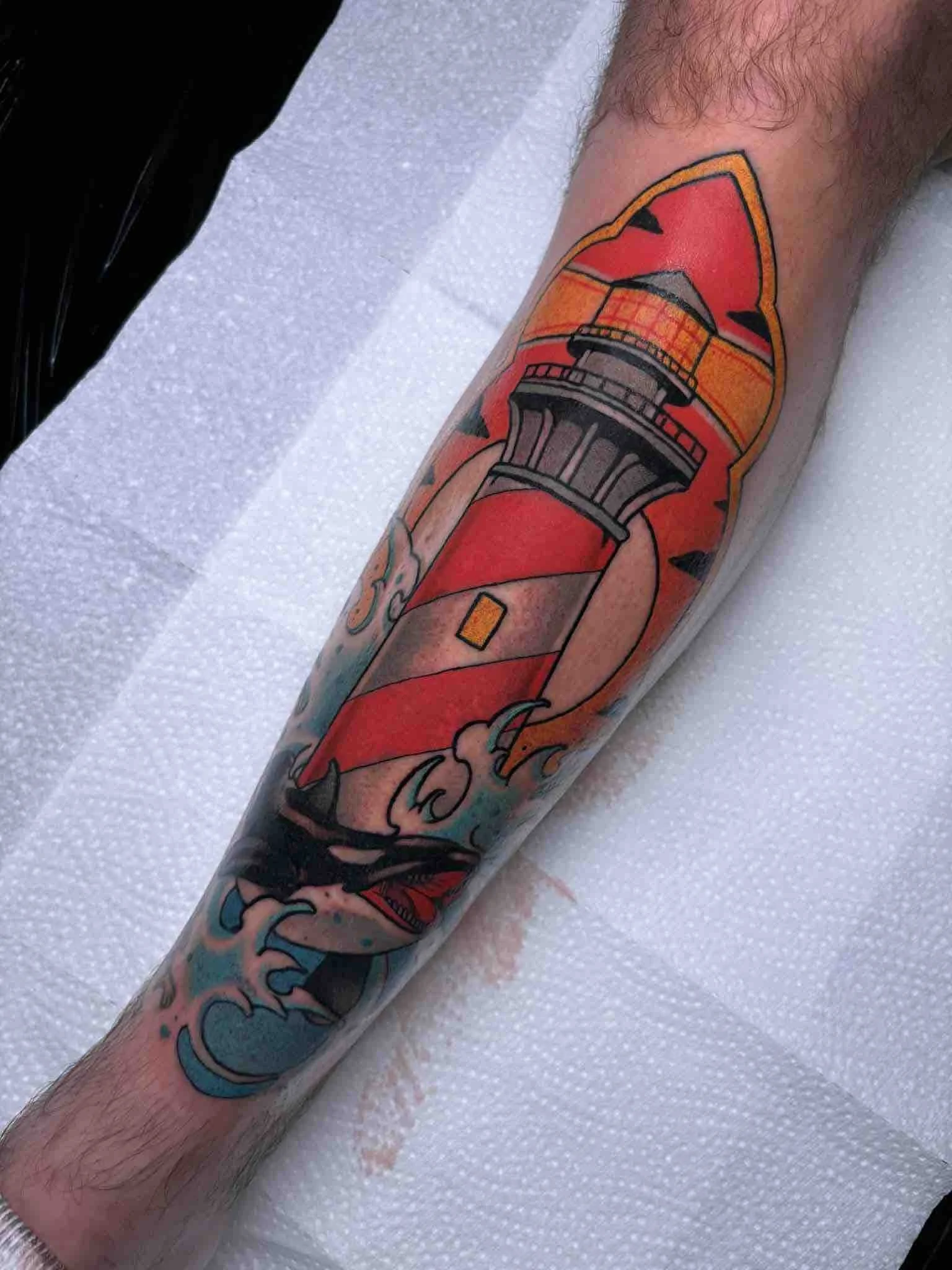 shark-bait-zoltan-lighthouse-neotrad-shin-tattoo.jpeg