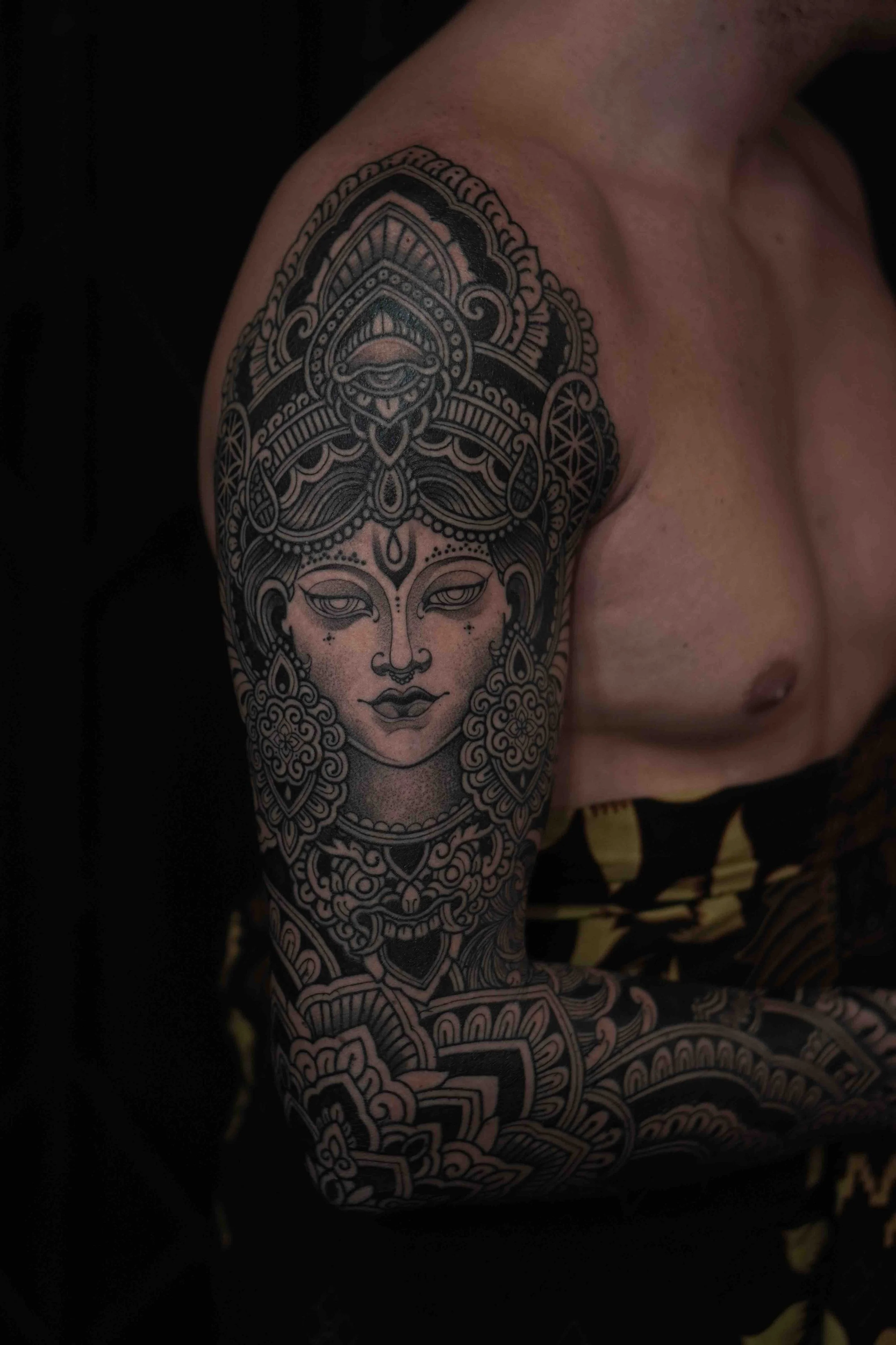 indonesian-inspired-tribal-mandela-full-arm-sleeve-tattoo.jpeg