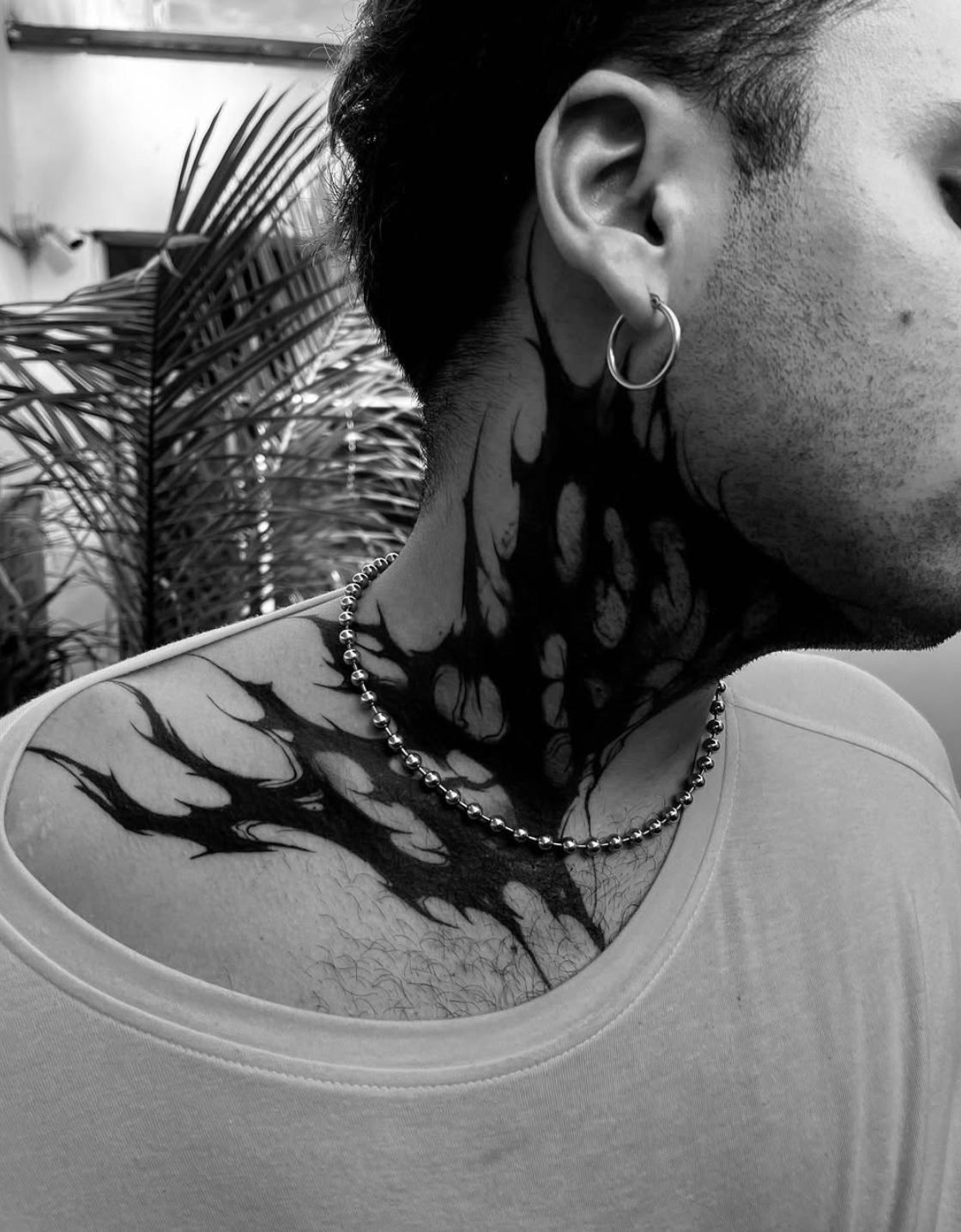 abstract-blackwork-neck-tattoo-cybersigil.jpeg