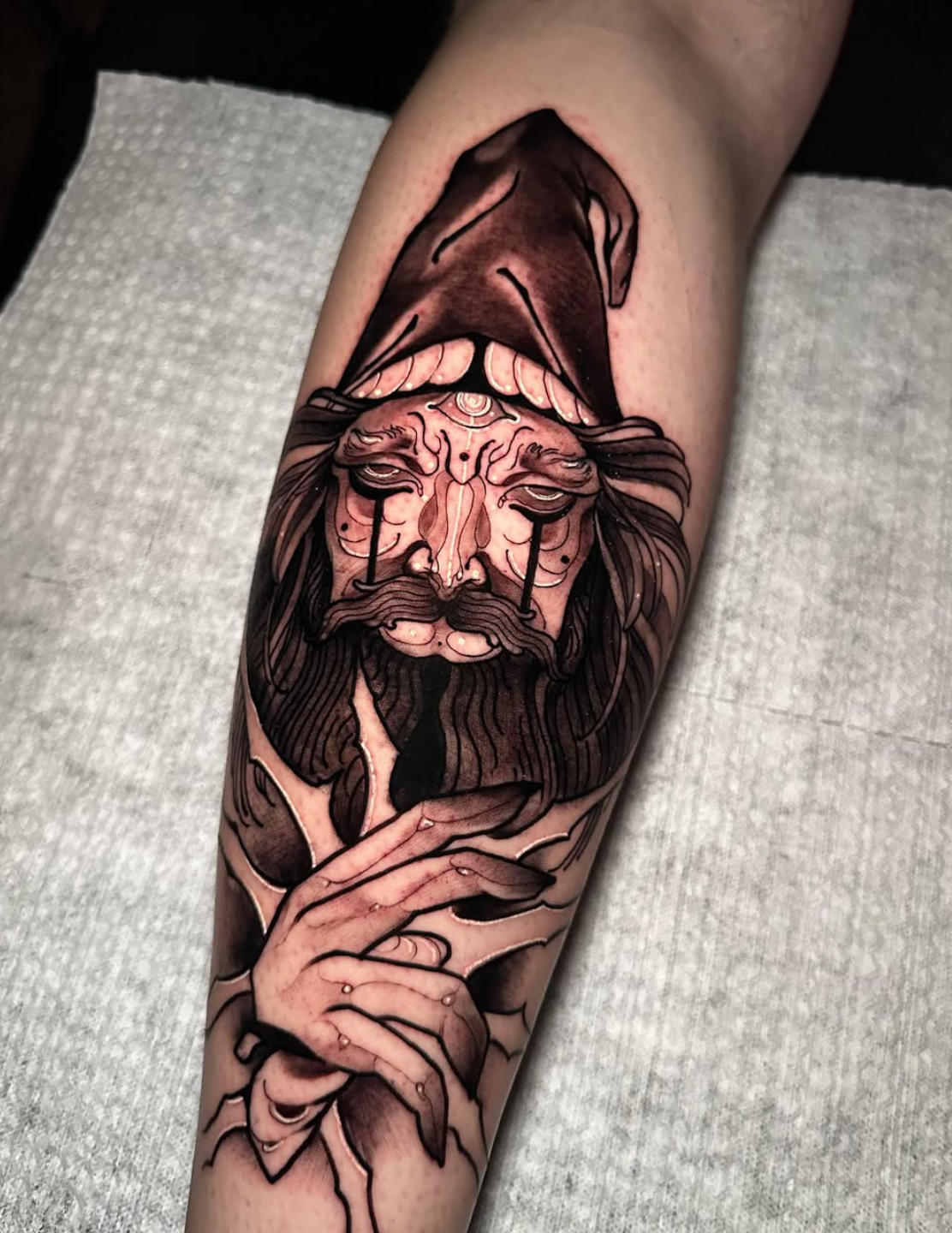 neo-realism-wizard-tattoo-black-and-grey-calf-tattoo.jpeg