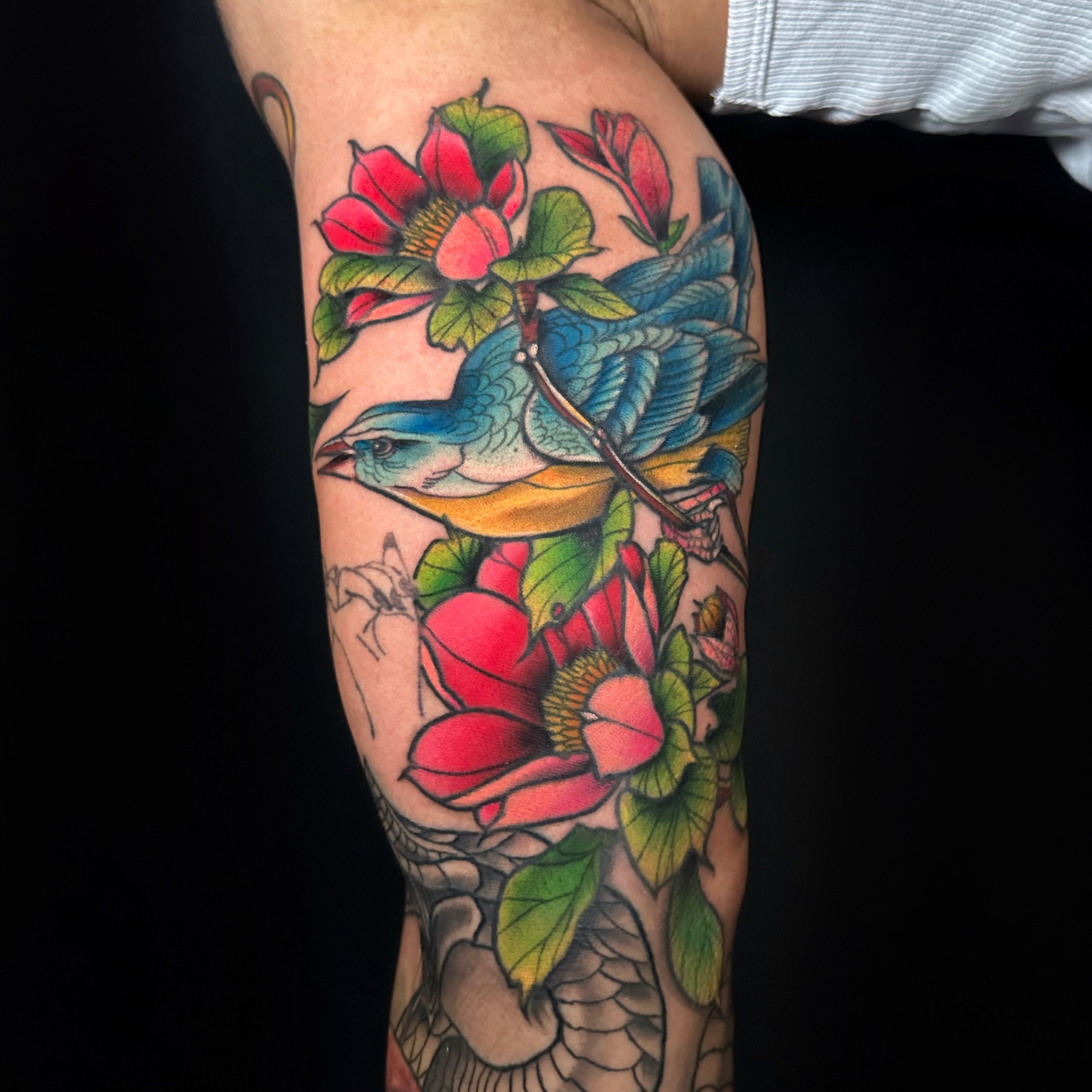 Botanical color tattoo idea on arm