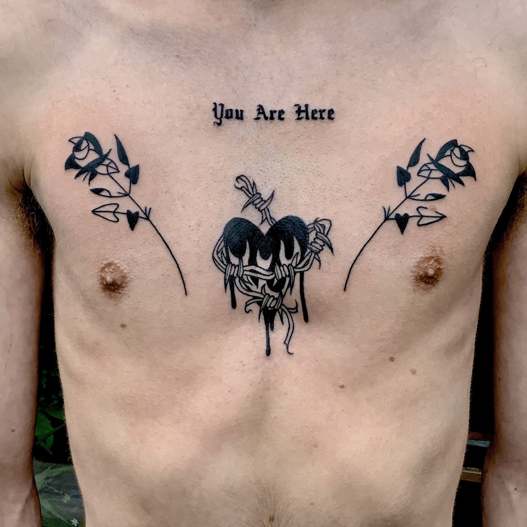 Roses and heart tattoo idea on chest