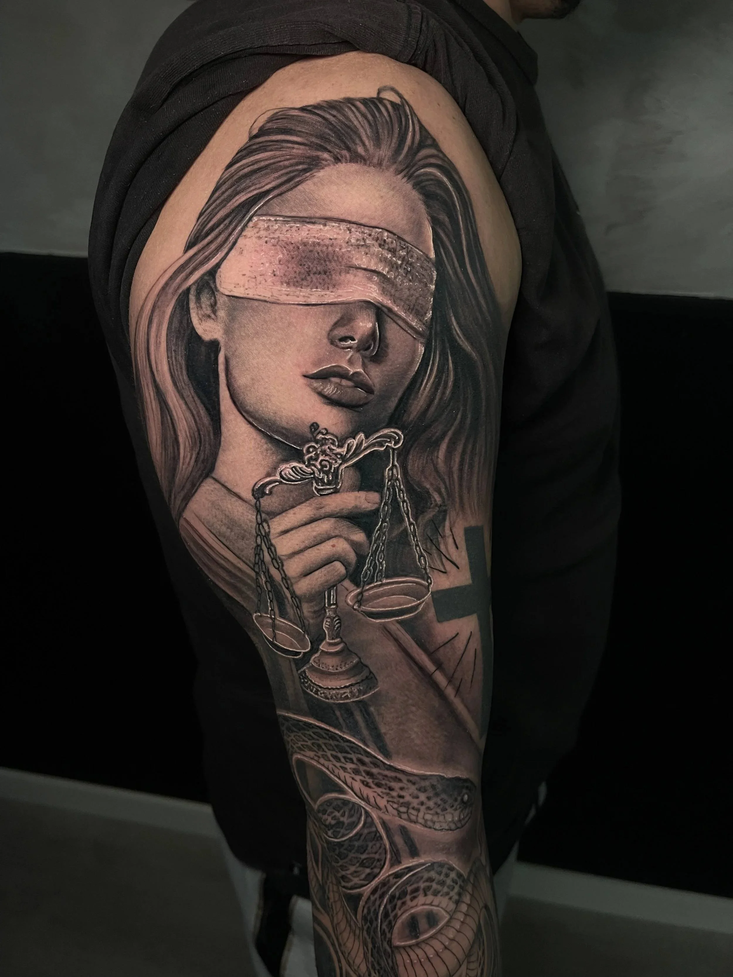 Black and grey realism tattoo