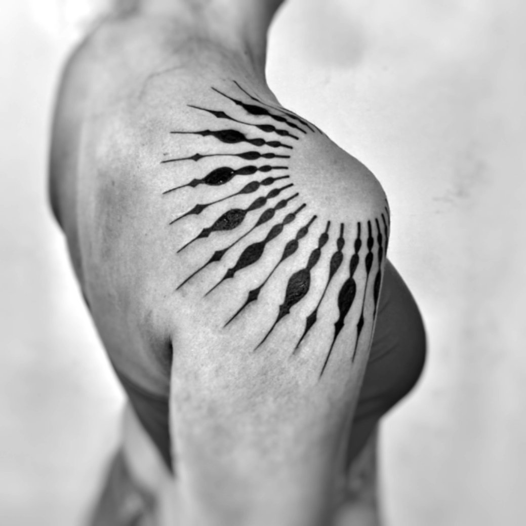 Ornamental Tribal Shoulder Tattoo