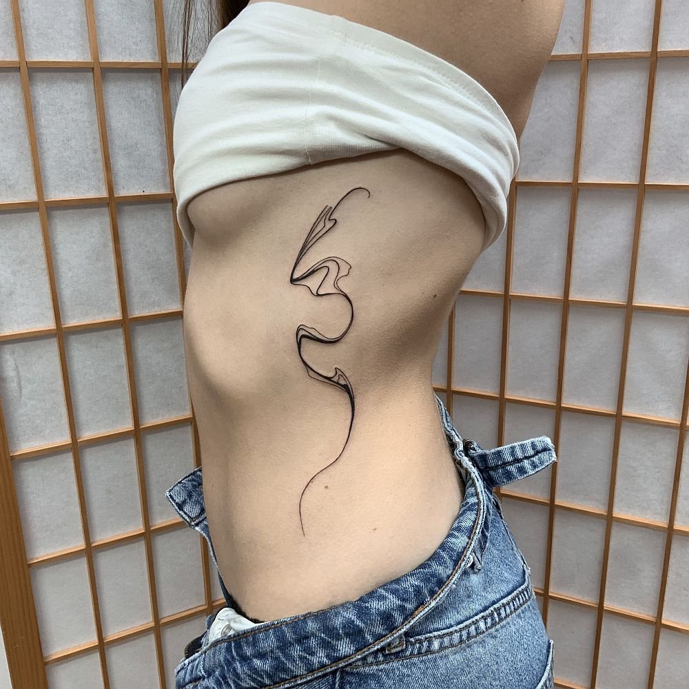 Organic fine lines tattoo idea for women