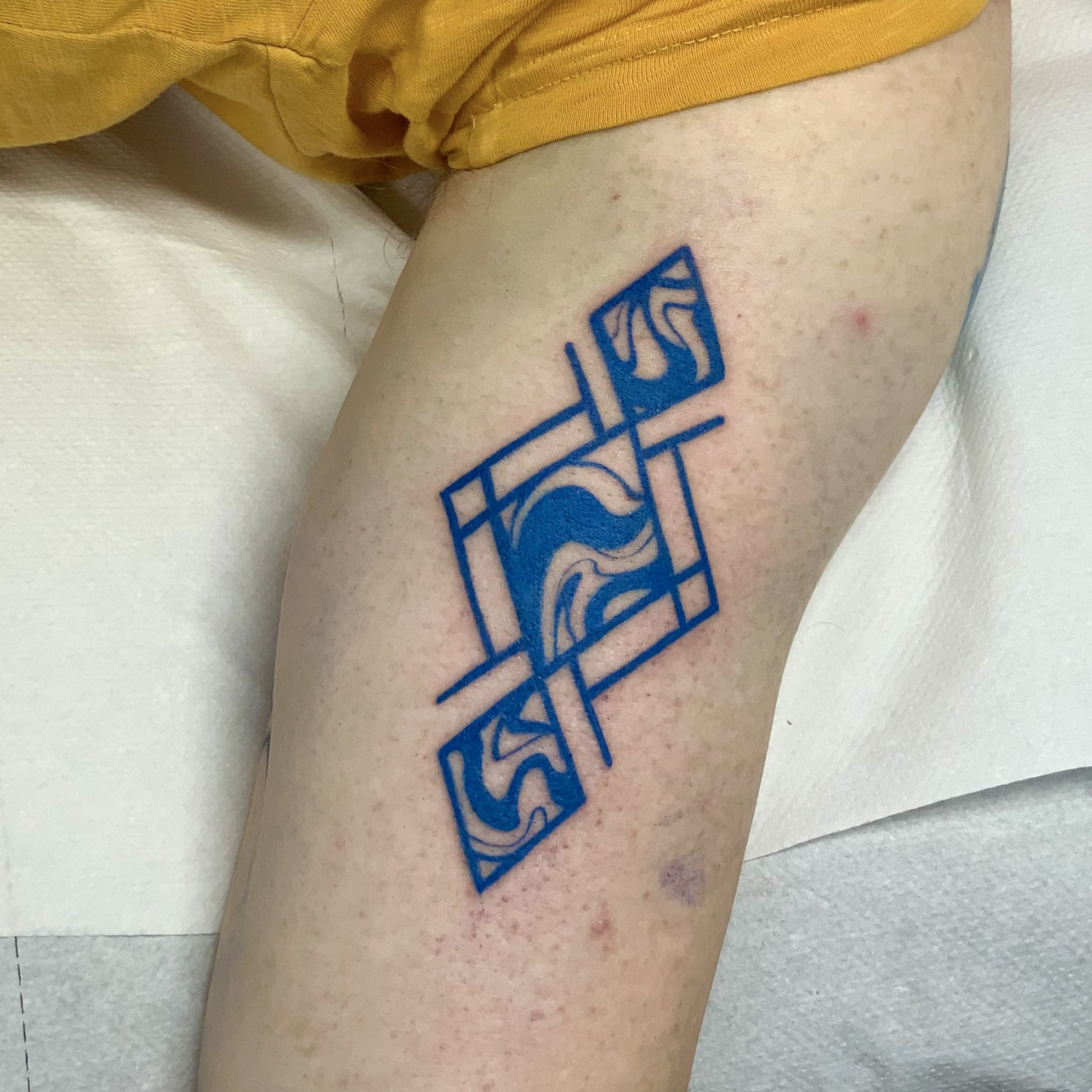 Geometric tattoo idea in Blue Ink