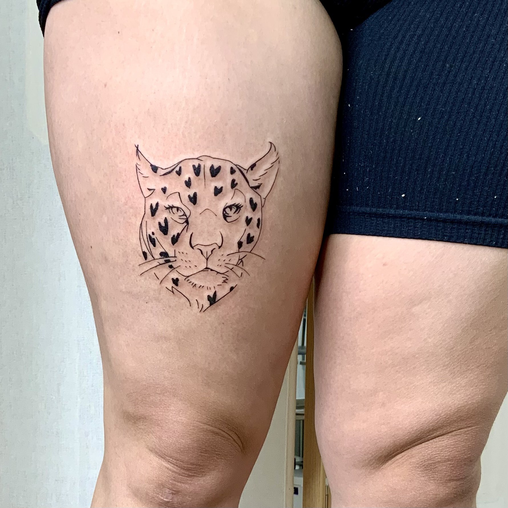 Panther face tattoo idea