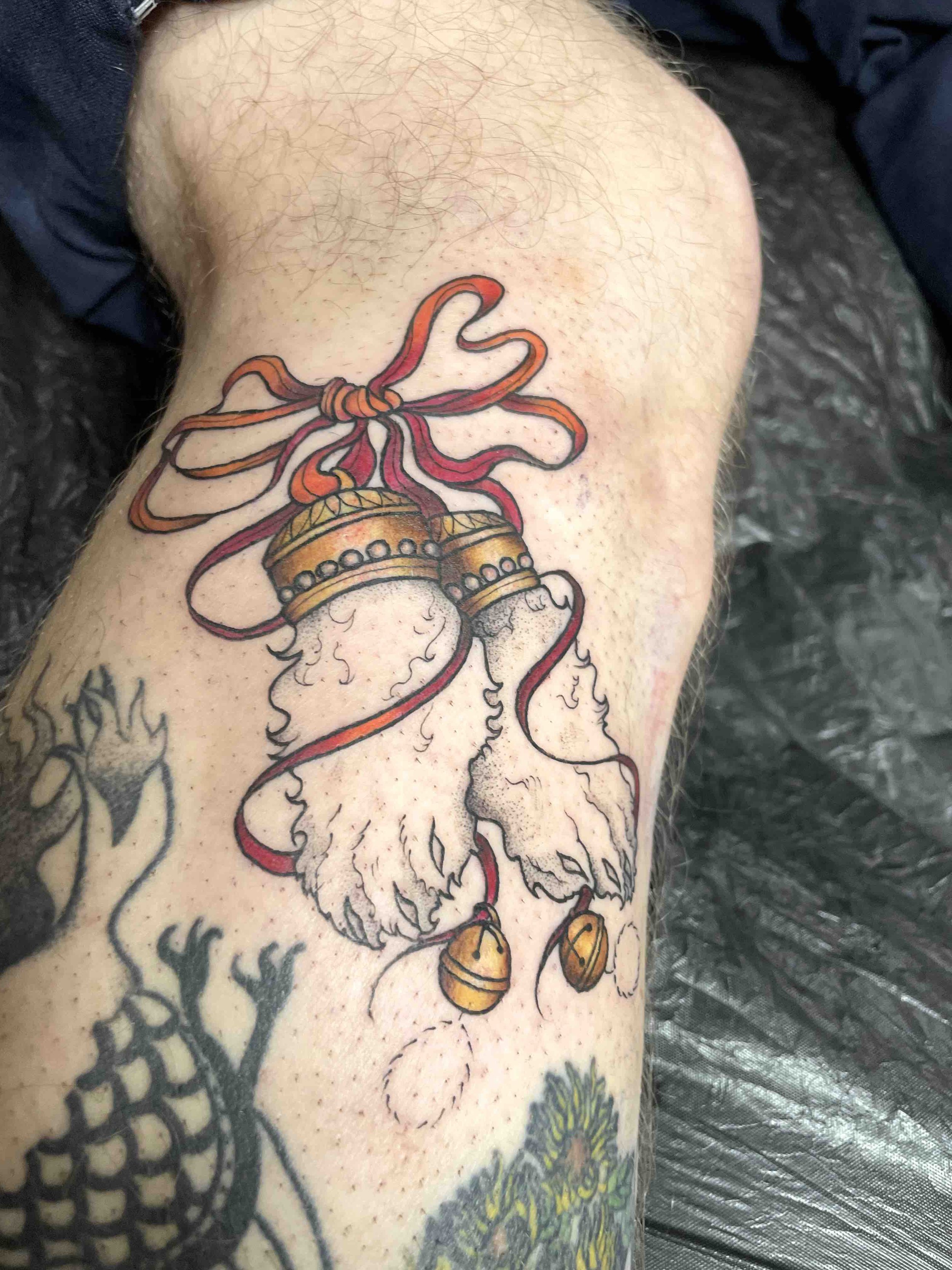 Lucky-rabbit-paws-calf-colourwork-tattoo.jpeg