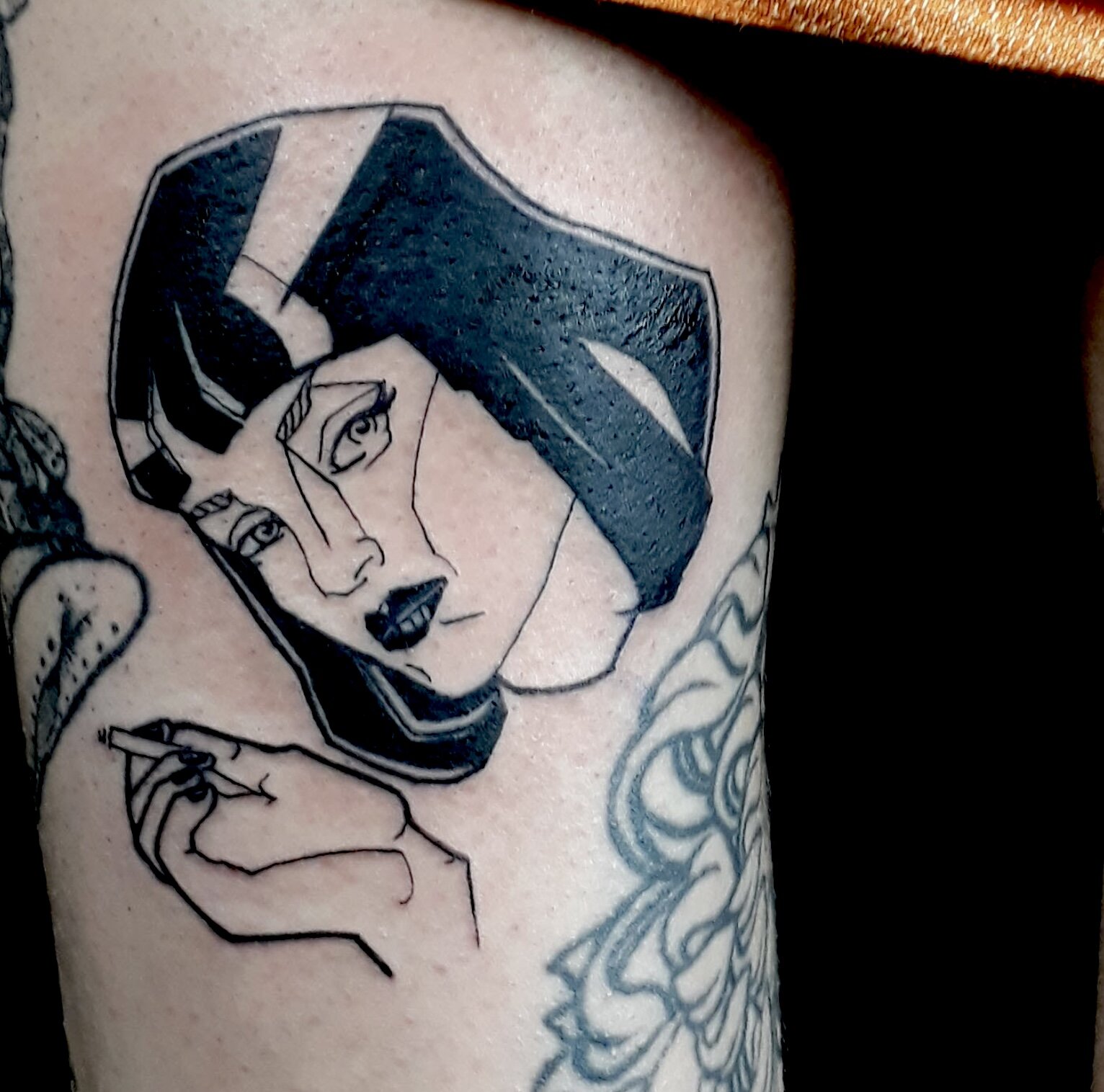 Pulp fiction tattoo idea in blackwork tattoo style