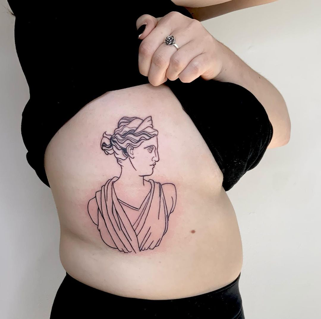 Roman woman statue tattoo idea
