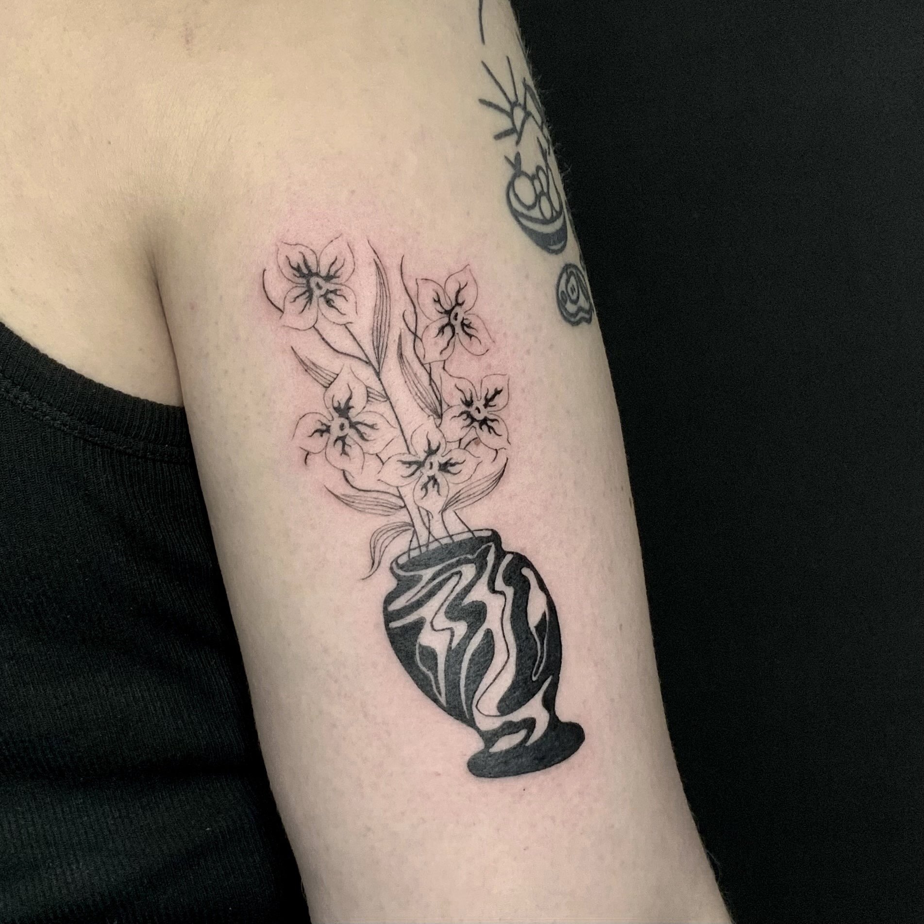 Flowers in Vase Tattoo Idea