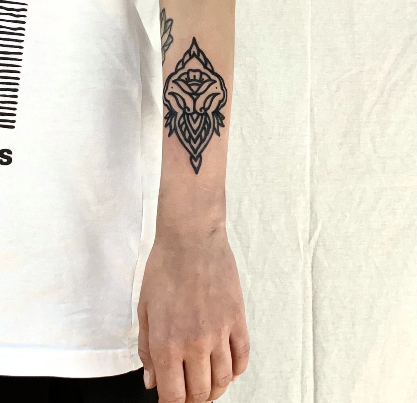 Mandala tattoo idea in blackwork tattoo style
