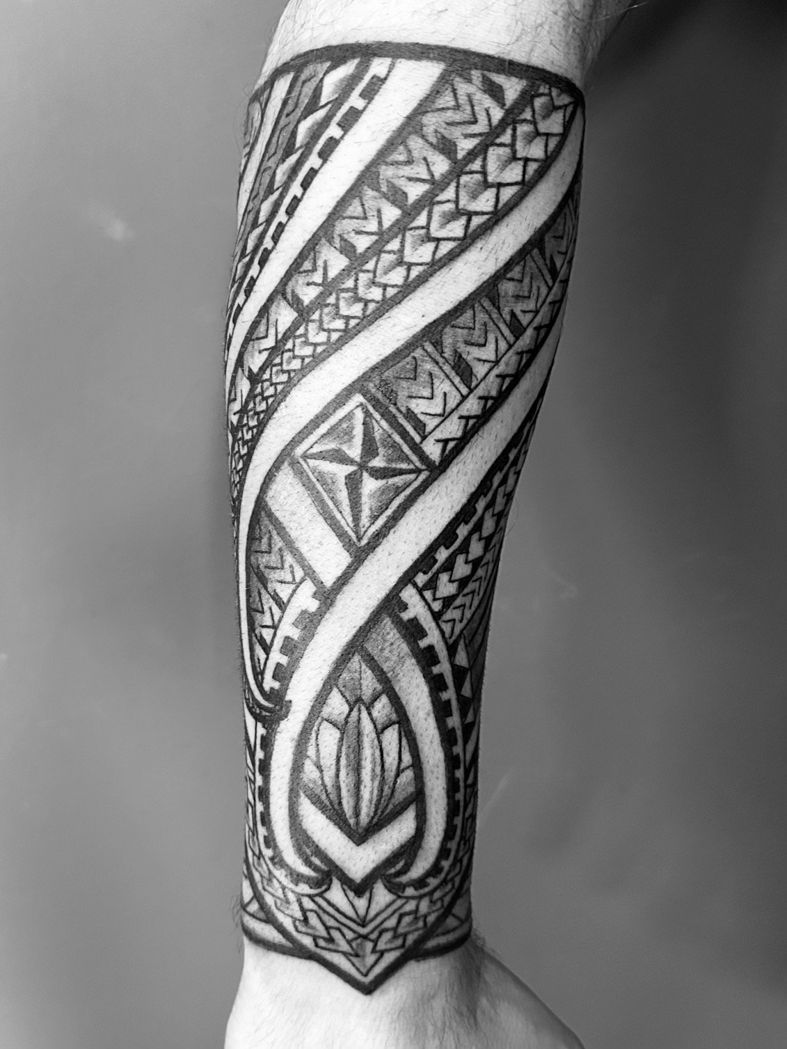 Tribal sleeve tattoo idee voor mannen