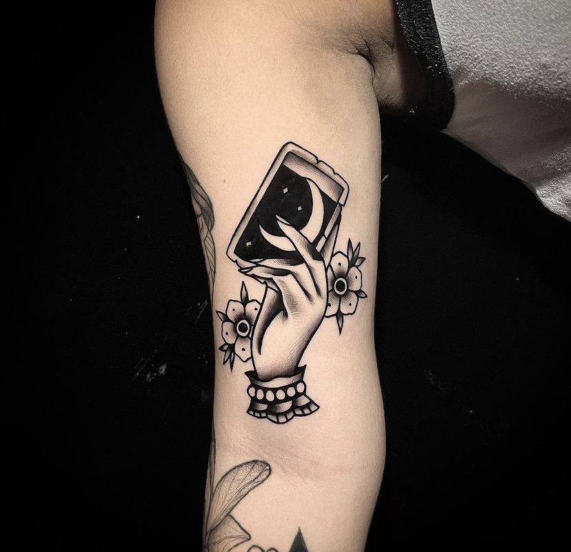 Blackwork tattoo idea on arm