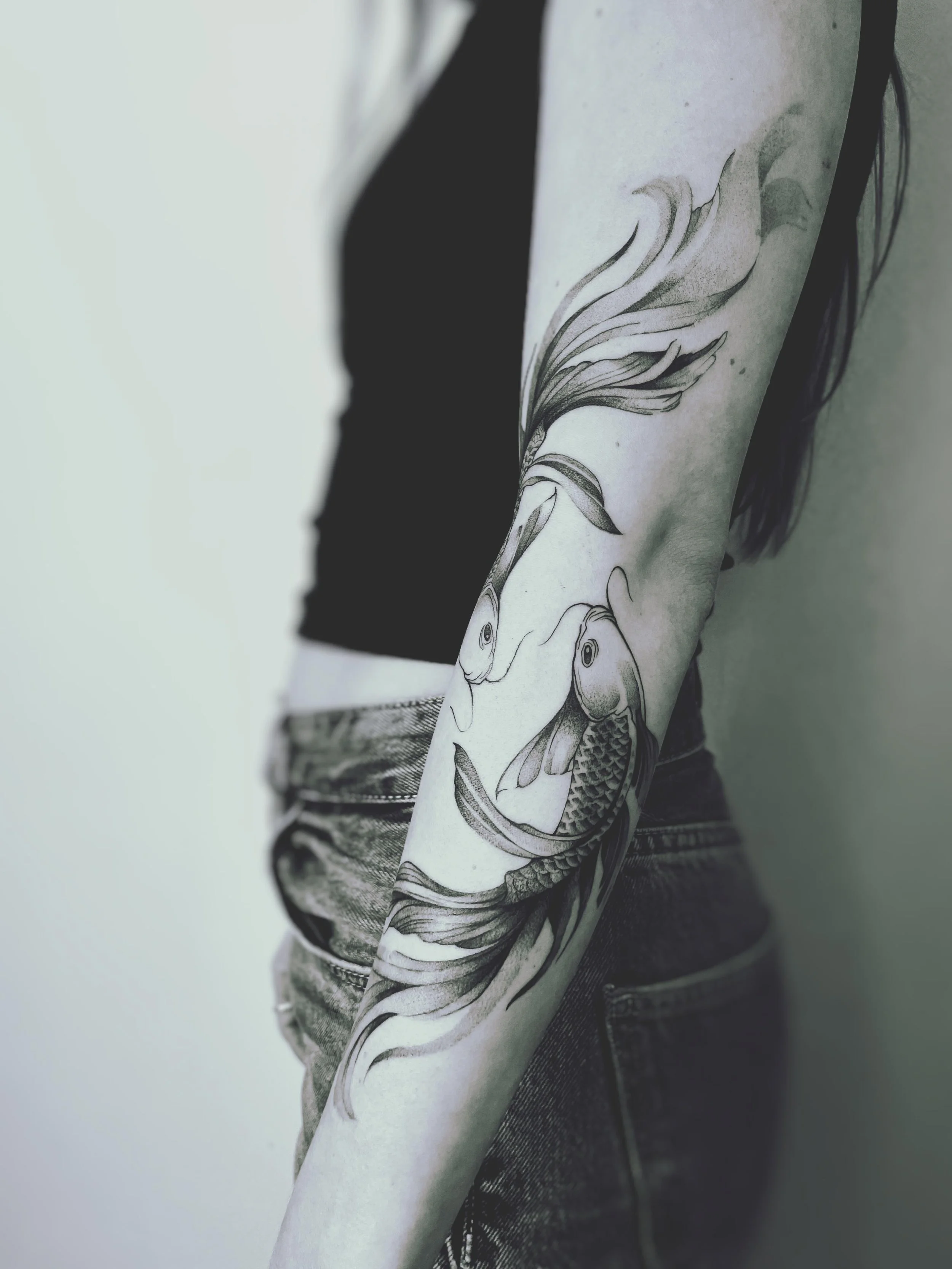 Fine Line Fish Sleeve Tattoo