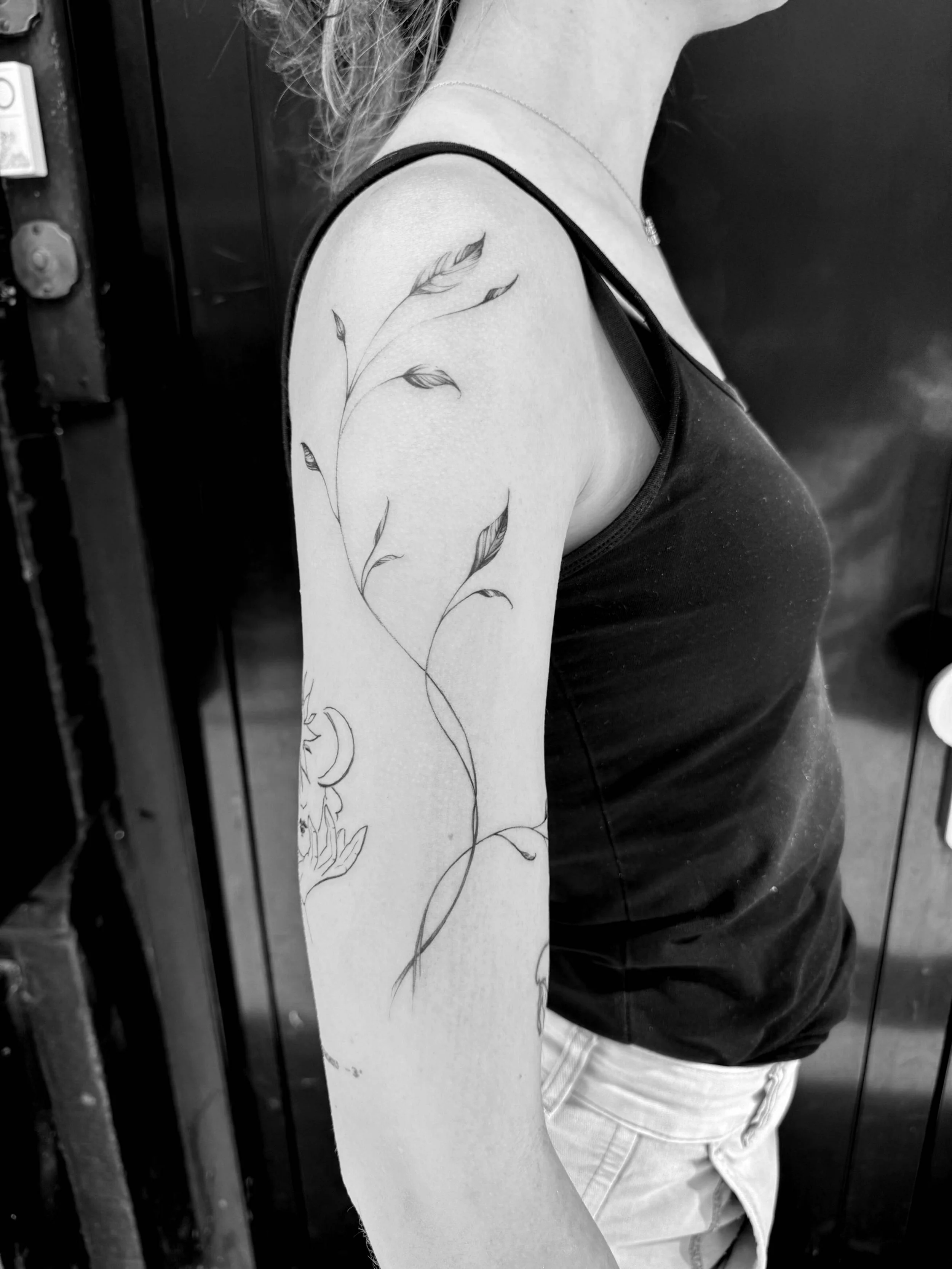 floral fine line tattoo Amsterdam