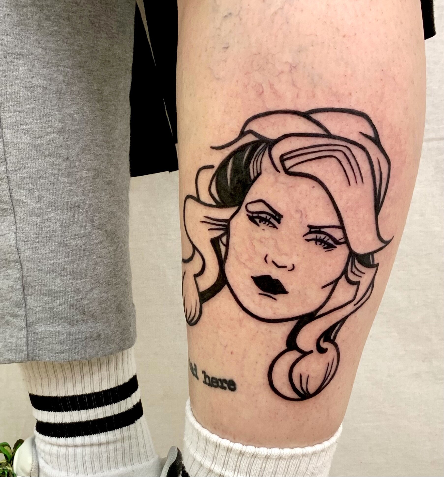 Girl face leg tattoo idea
