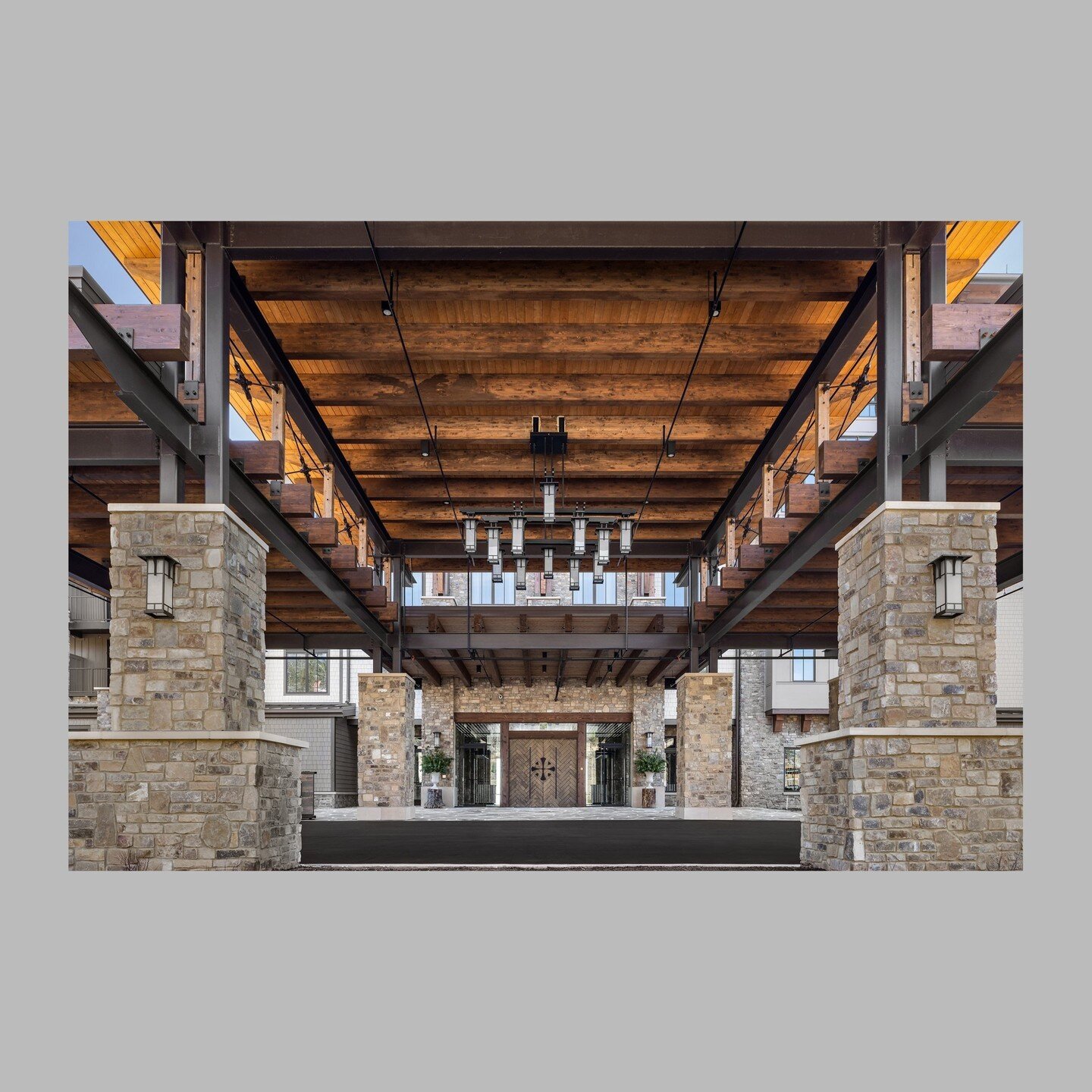 We are incredibly proud of Cloudland's arrival experience. The Porte Cochere is designed with tapered steel,  Douglas Fir Glulam beams, and custom trusses. Locally sourced stone and signature castle style doors draw on the inspiration of McLemore Cov
