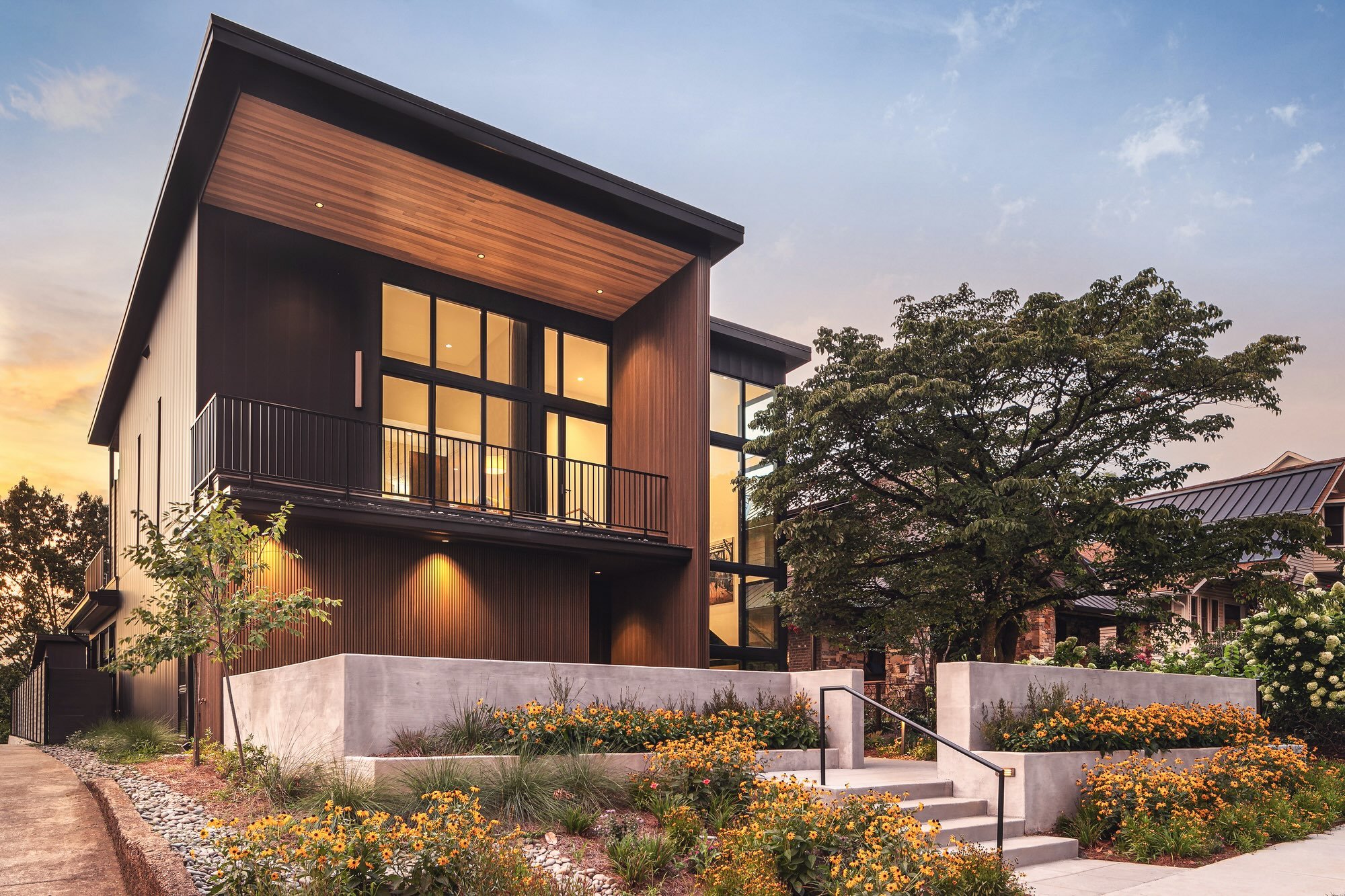 Modern design, thoughtfully integrated.  The 4,500 SF Modern Heritage House brings contemporary design to an established neighborhood of historic homes. Every detail was carefully considered, from the dramatic floor-to-ceiling front window and custom