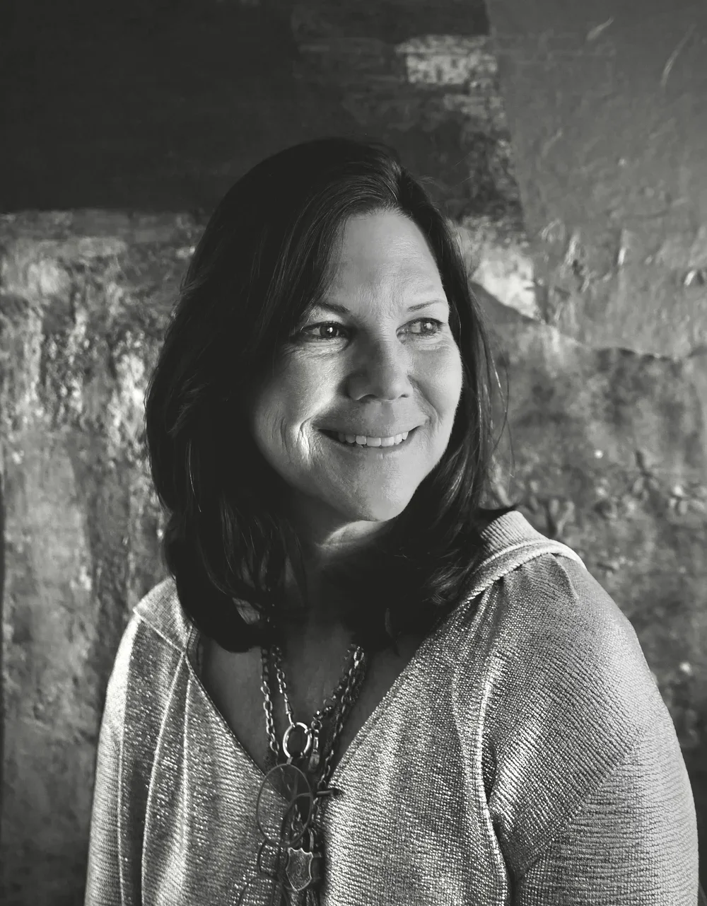Black and white portrait of interior designer and architect in soft natural light
