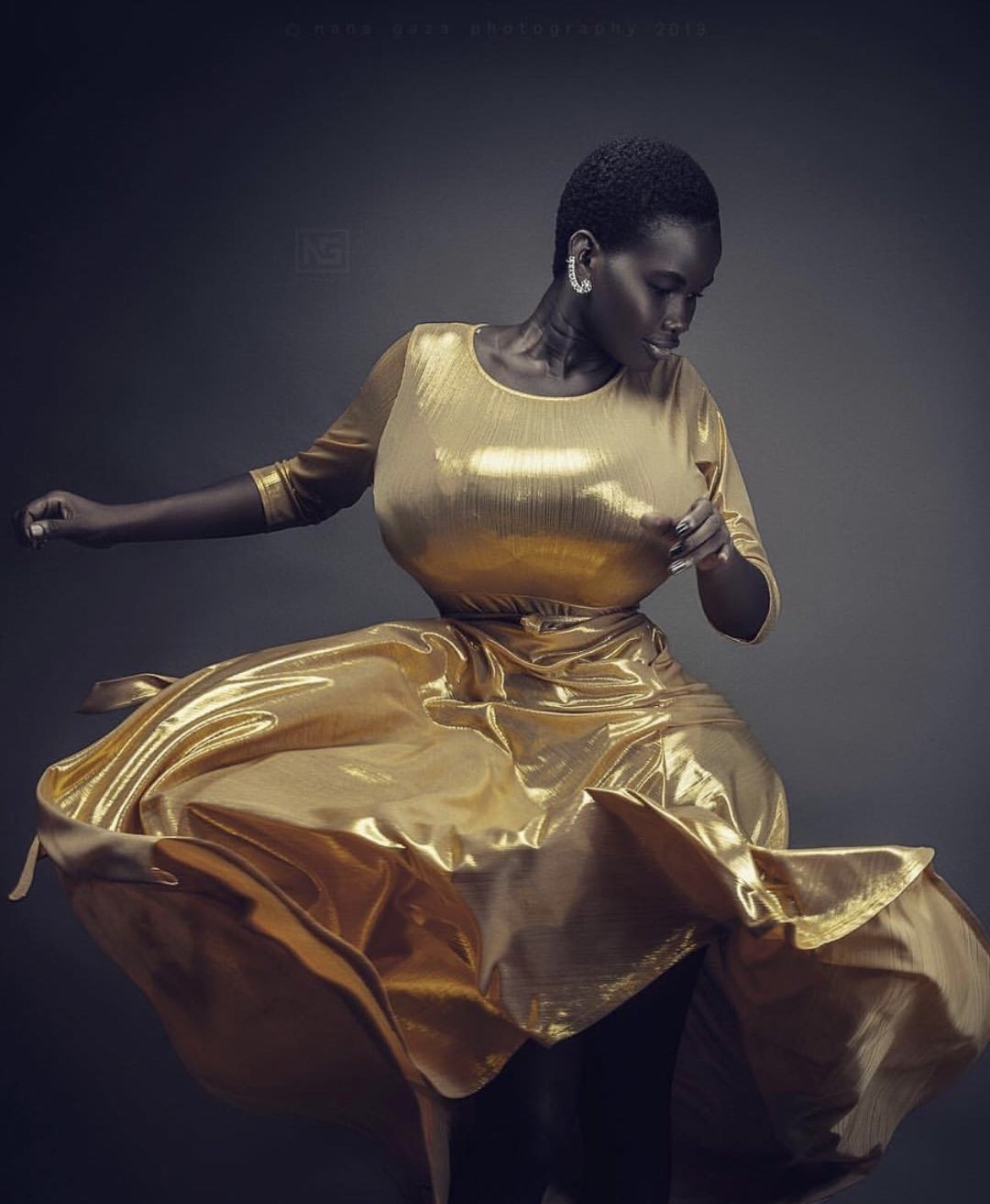 "Bold in Black, Glowing in Gold: A Curvy Style Icon"