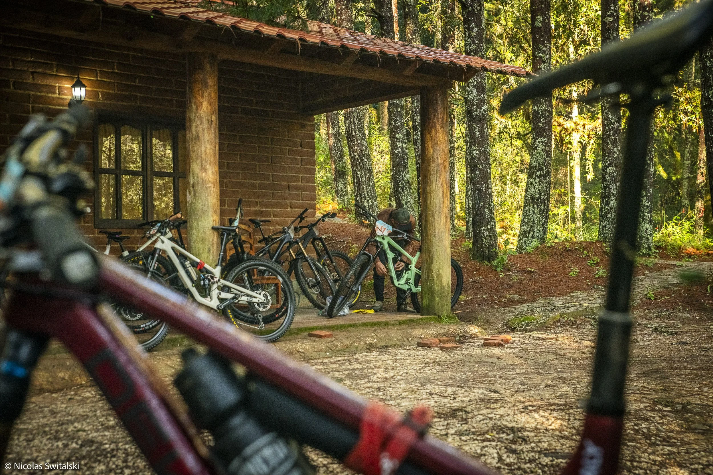 Riders relaxing at Casa Transierra lodge after a mountain bike ride in Oaxaca