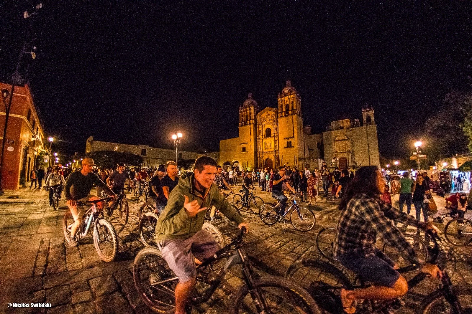 Mountain bike riders arriving in Oaxaca City after descending from the Sierra Norte