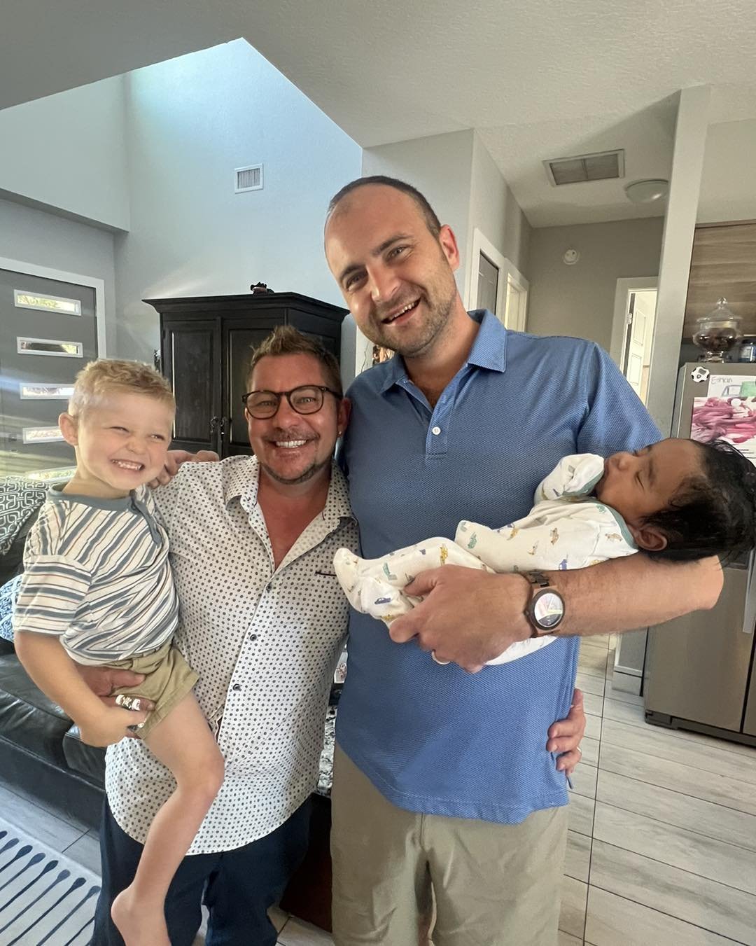 These two dads.  Love them!  Their family is now complete thanks to adoption.  Life is a bit hectic for them right now, but they wouldn't want it any other way! 🌈💜