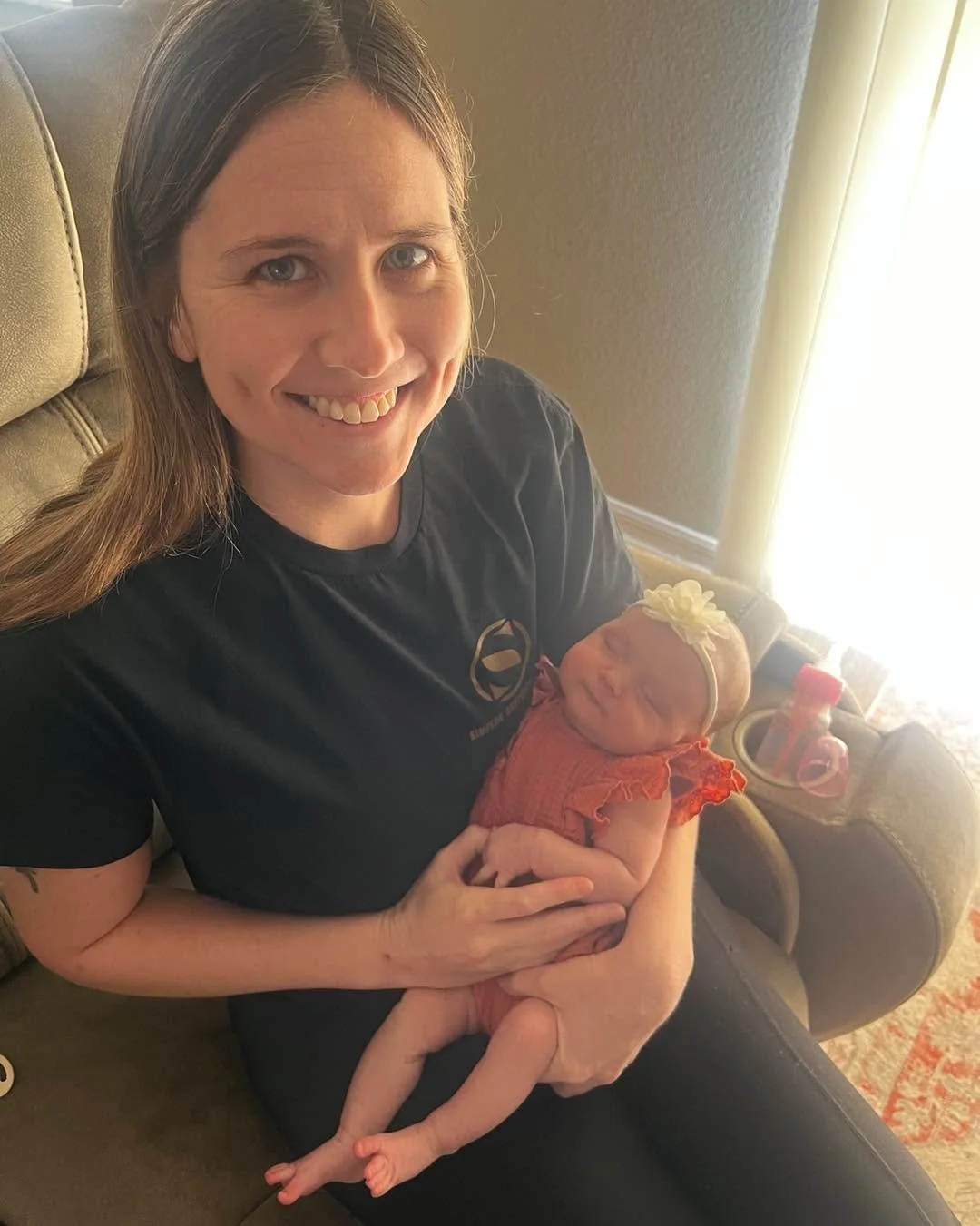 Mom&rsquo;s happy dimples are powered by new baby girl and strong coffee.