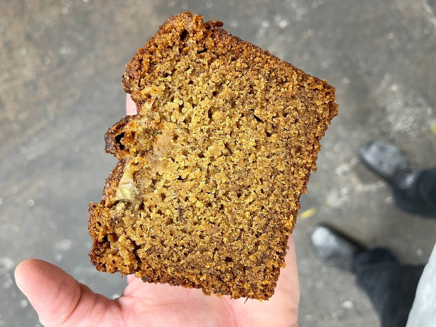 Our vegan banana tea cake is now being sold in slices cut from a larger loaf. We're going this way because a bigger loaf yields a more moist cake, it reduces the amount of packaging we use, and a single slice is easier to eat in a single serving than