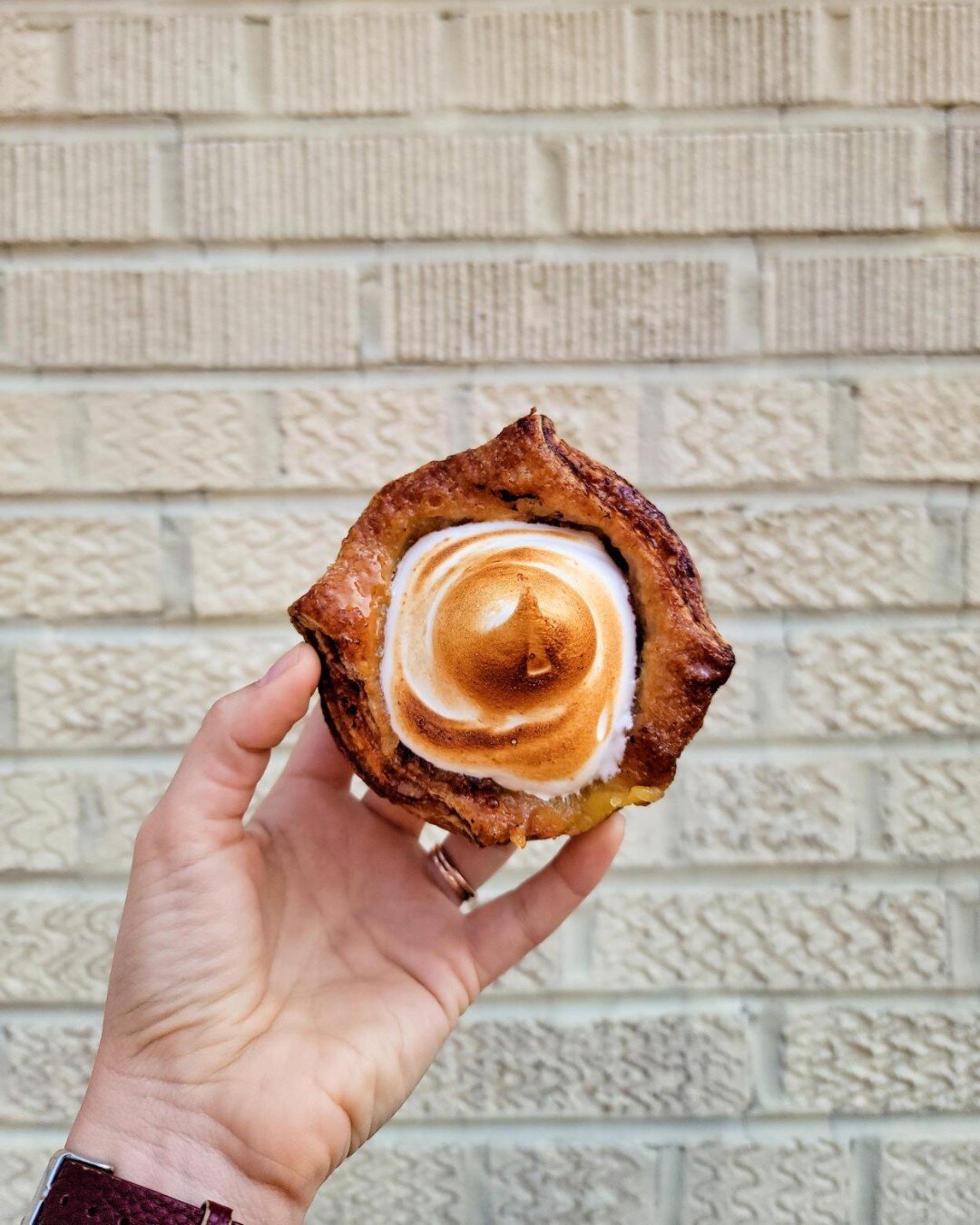 We filled our kouign amann with lemon curd and then topped it with meringue. Available at Atticus Market.