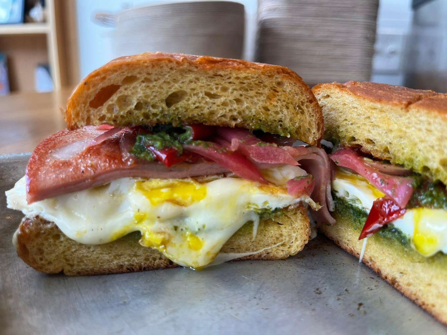 Mortadella is back! With a few tweaks.

Our mortadella breakfast sandwich has returned. Now served with 2 eggs, mortadella, American cheese, pickled peppers &amp; onions topped with pesto on a sweet potato brioche bun

Start your morning right 🌞

#c