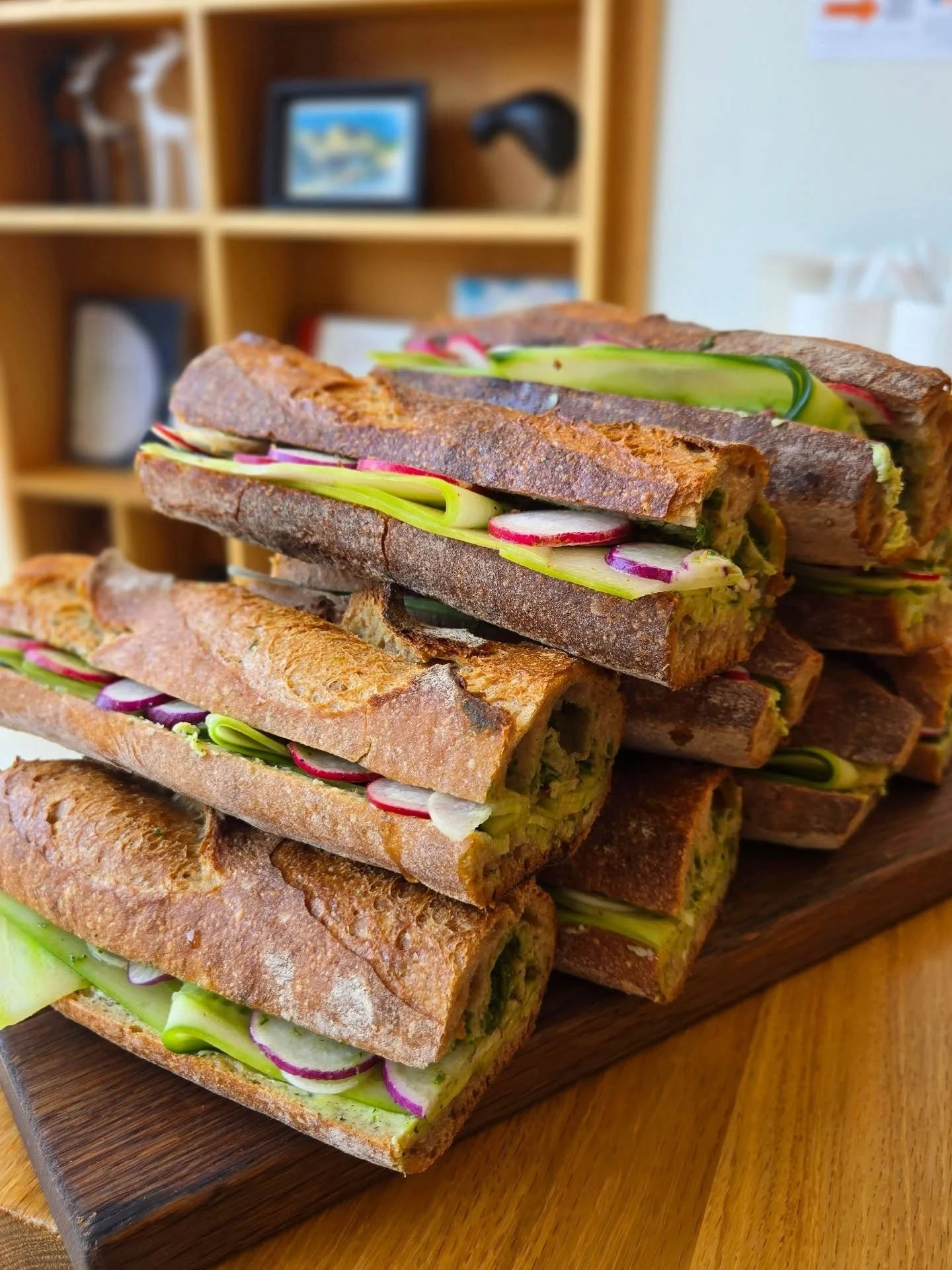 Spring Baguette 🌱🌞
@atticusbakery baguette with thinly sliced Easter egg radishes, cucumbers, whipped honey butter, radish top pesto &amp; dill 

Available every Friday &amp; Saturday now through the end of April
📍771 Orange St - Atticus Market
