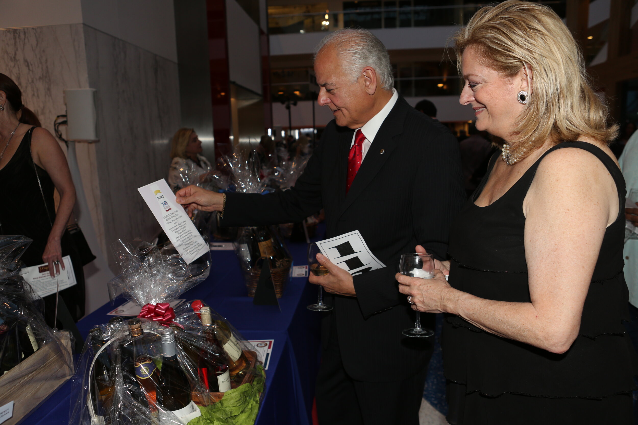 John and Bonnie and silent auction.JPG
