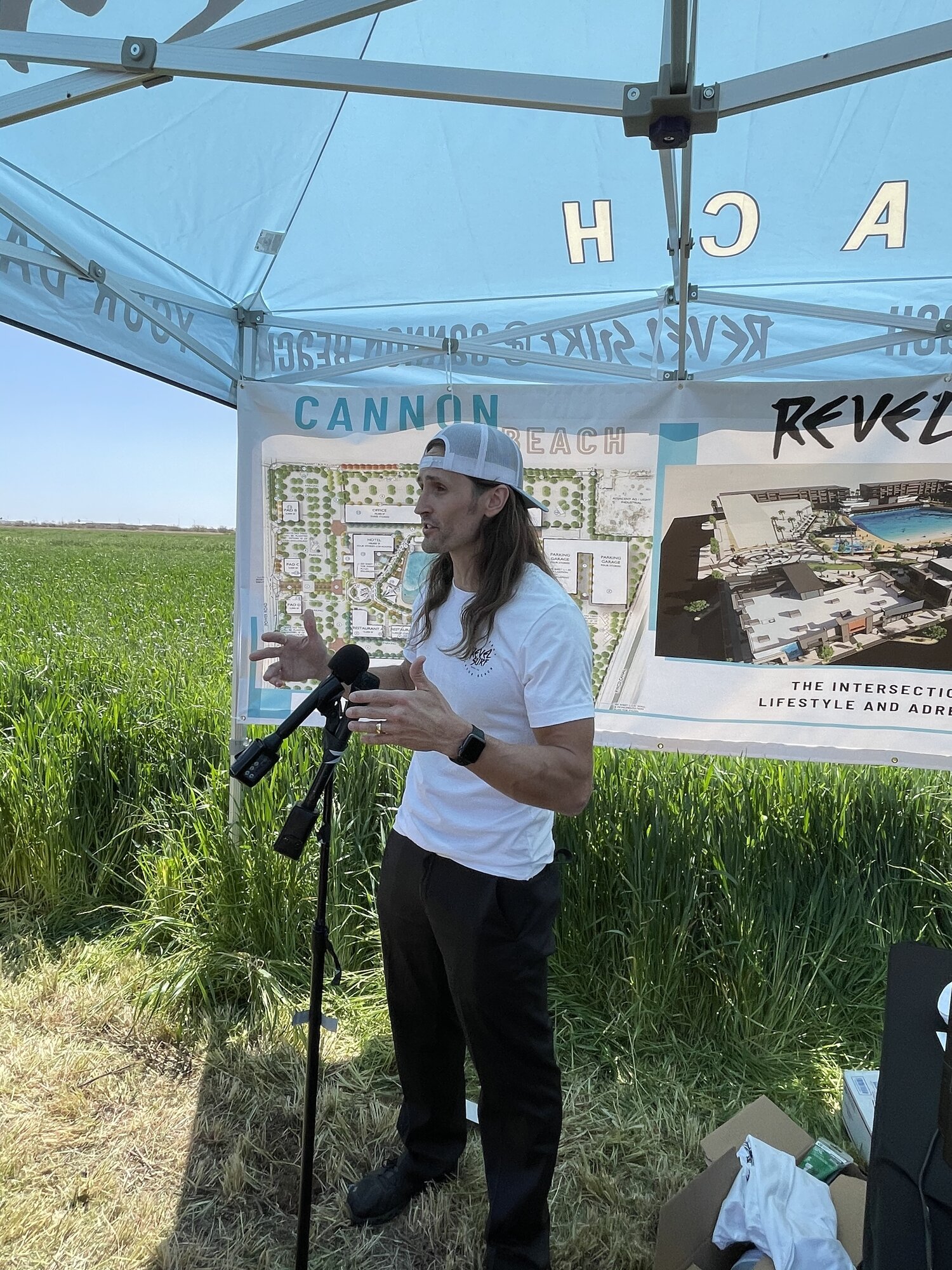 Cole Cannon presenting the vision for Cannon Beach: an all-in-one surf resort powered by Revel Surf. The resort is planned to have a surf lagoon, accommodations, restaurants, retail shops, a full gym, and office space for lease, among other amenities.