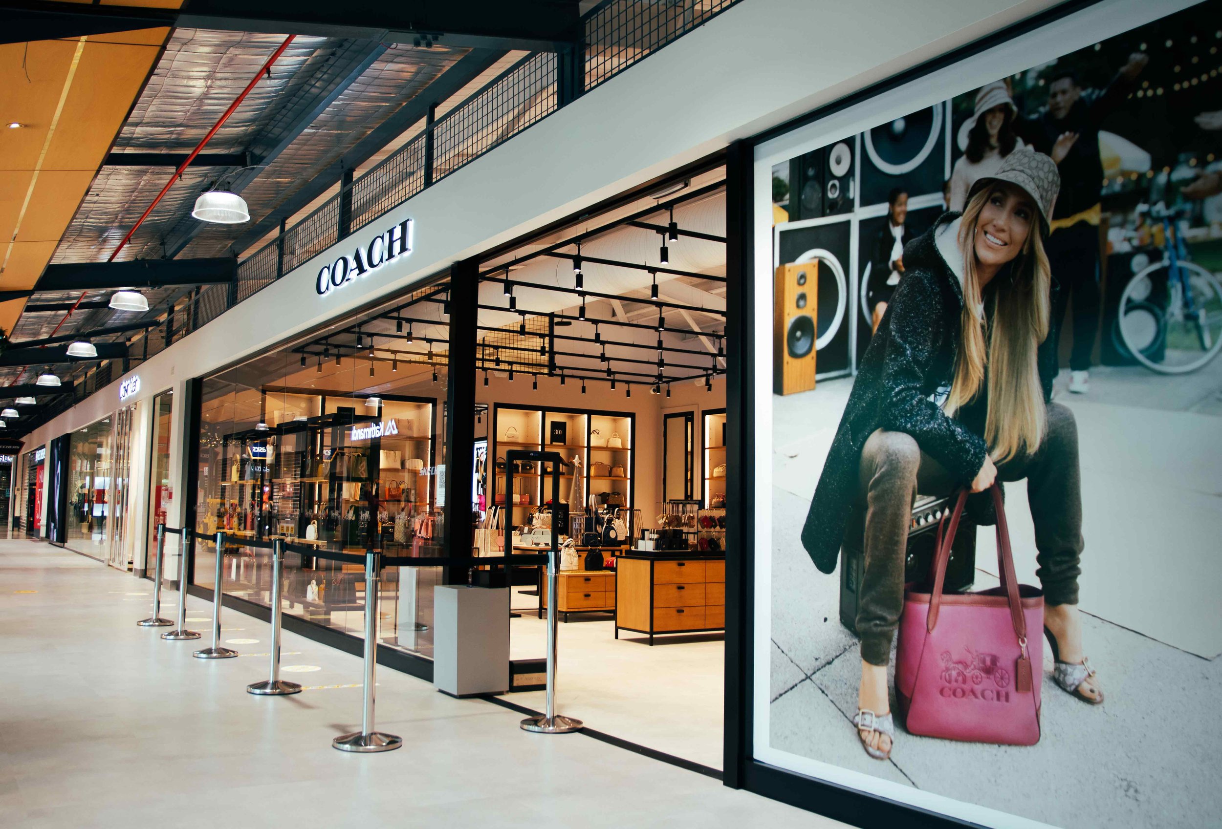 NZ's first Coach outlet store opens in Dress Smart! — Tailor Inc.