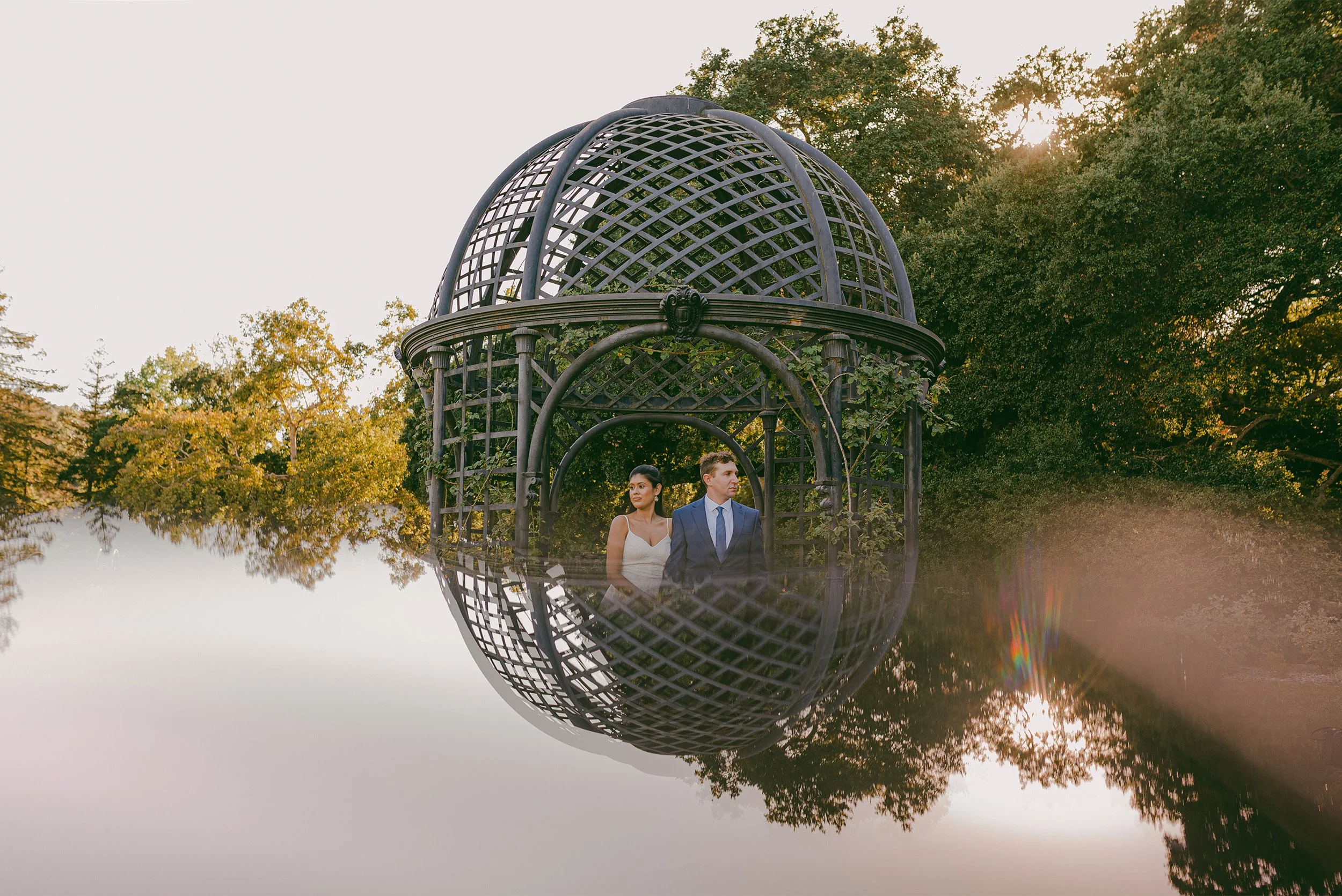 Couple framed inside garden gazebo, highly recommended engagement photographer Orange County