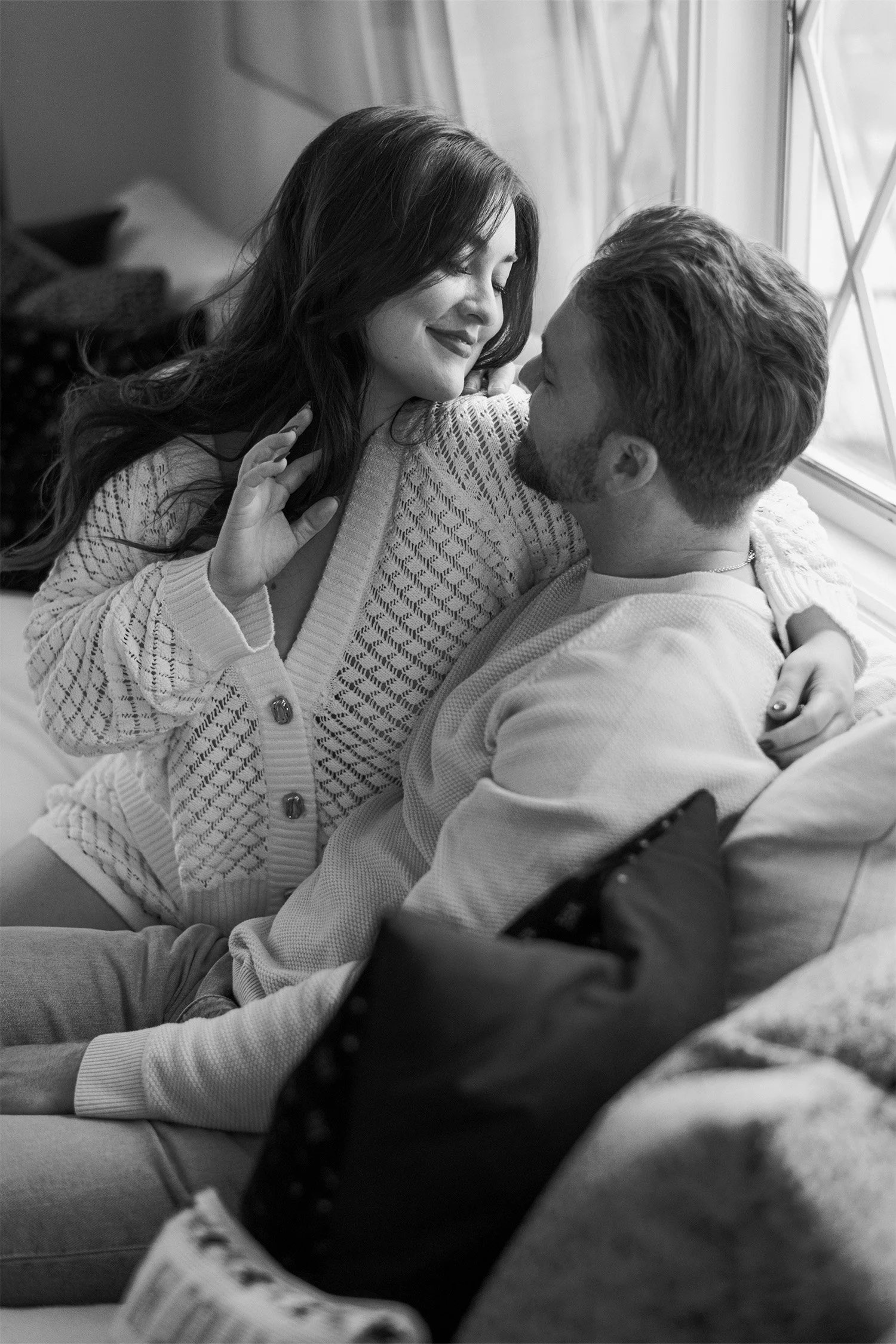 Award-winning engagement photographer in Orange County captures intimate close-up of engaged couple, in home engagement session