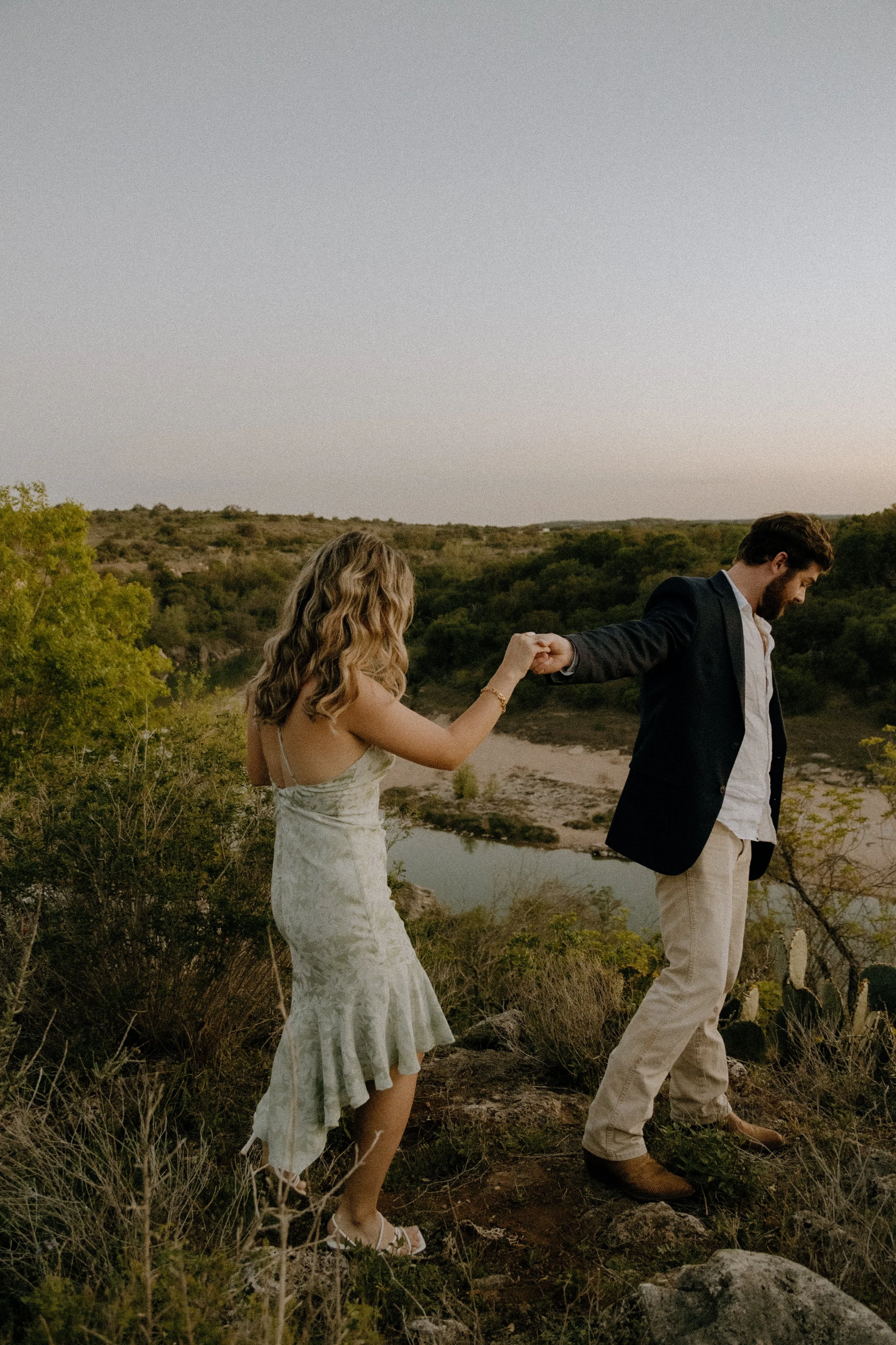 Houston & Texas Family, Couples, Newborn, Maternity, Bridal Photography – Bride-inspired flowing dress portraits in Austin TX hills.