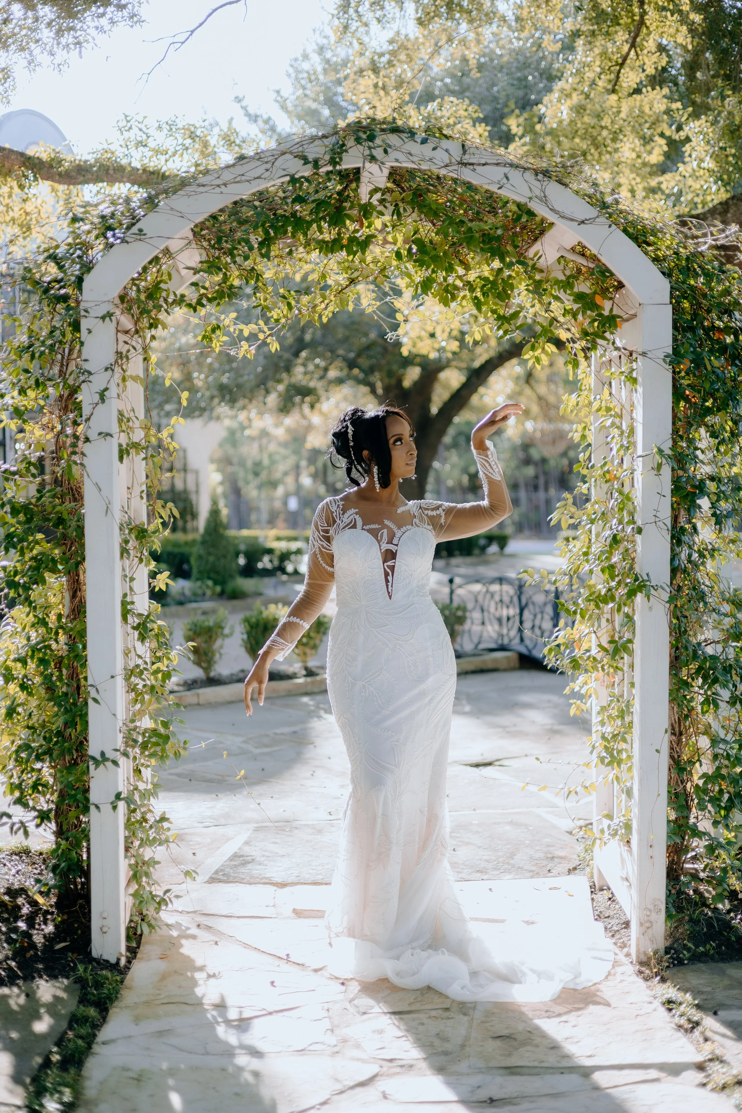 Houston & Texas Family, Couples, Newborn, Maternity, Bridal Photography – Bride framed by garden archway, The Woodlands TX wedding photo.