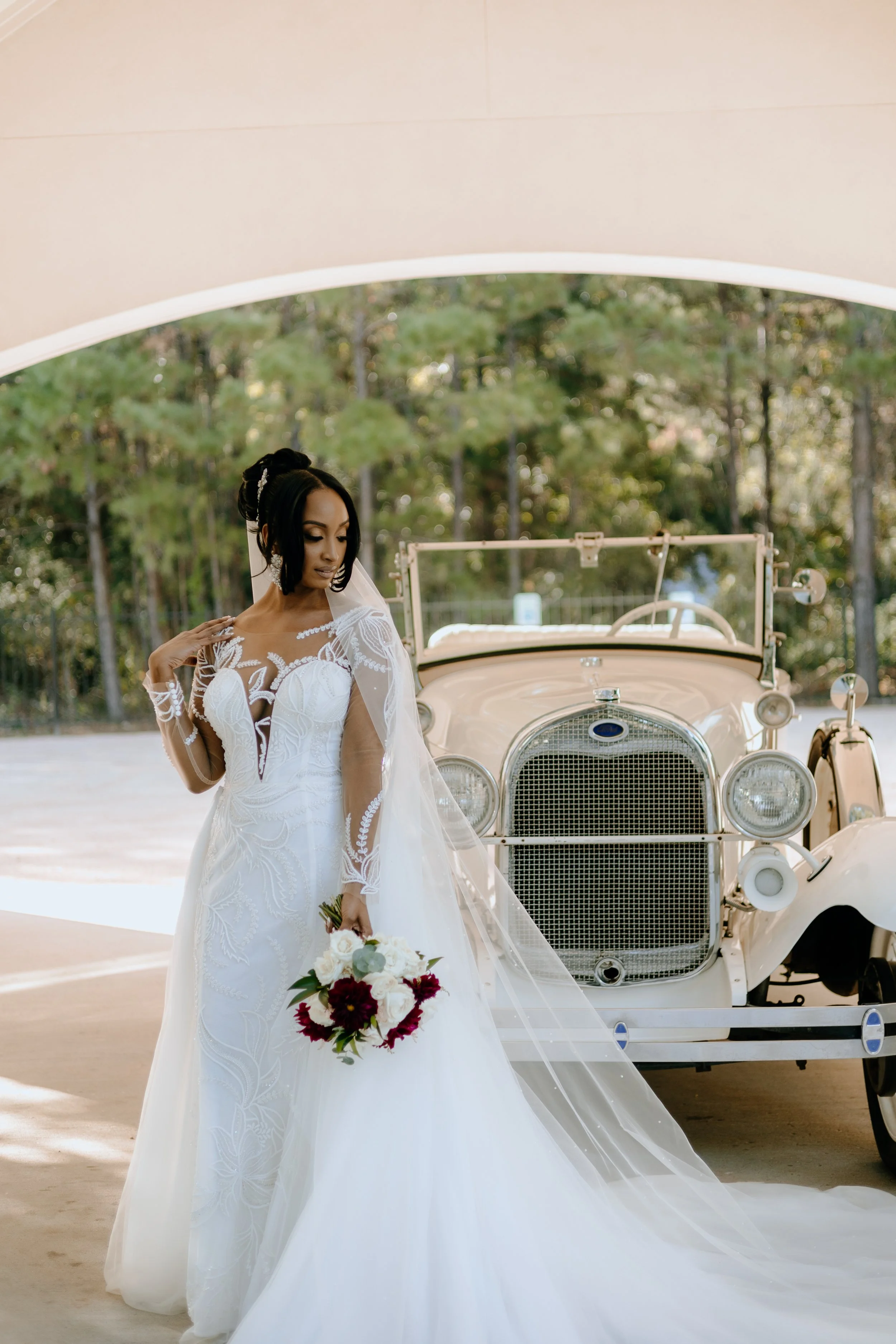 Houston & Texas Family, Couples, Newborn, Maternity, Bridal Photography – Elegant bride in lace gown at Peach Orchard Venue outdoors.