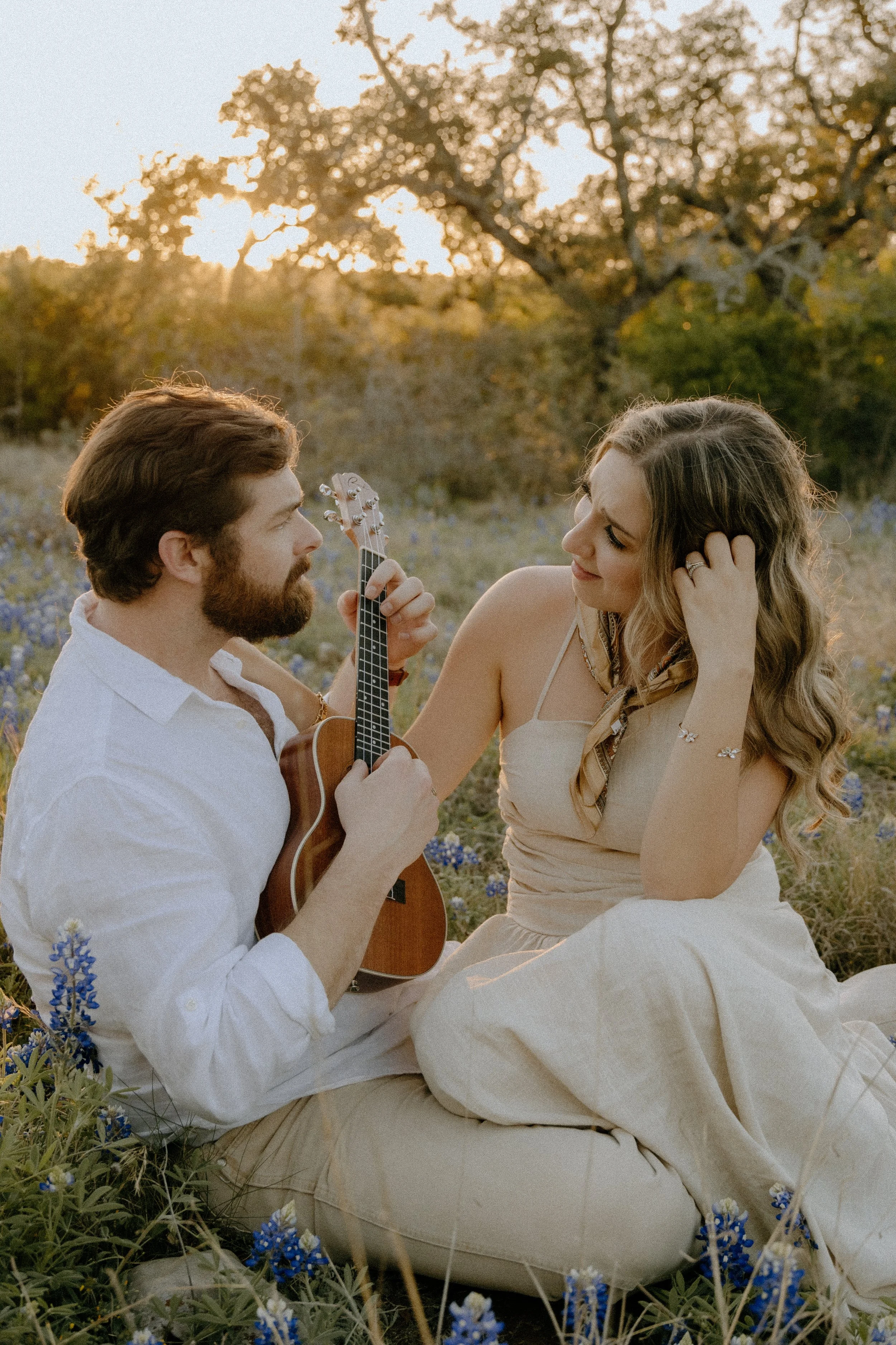 Houston & Texas Family, Couples, Newborn, Maternity, Bridal Photography – Romantic musical moment in golden hour Austin TX wildflowers.