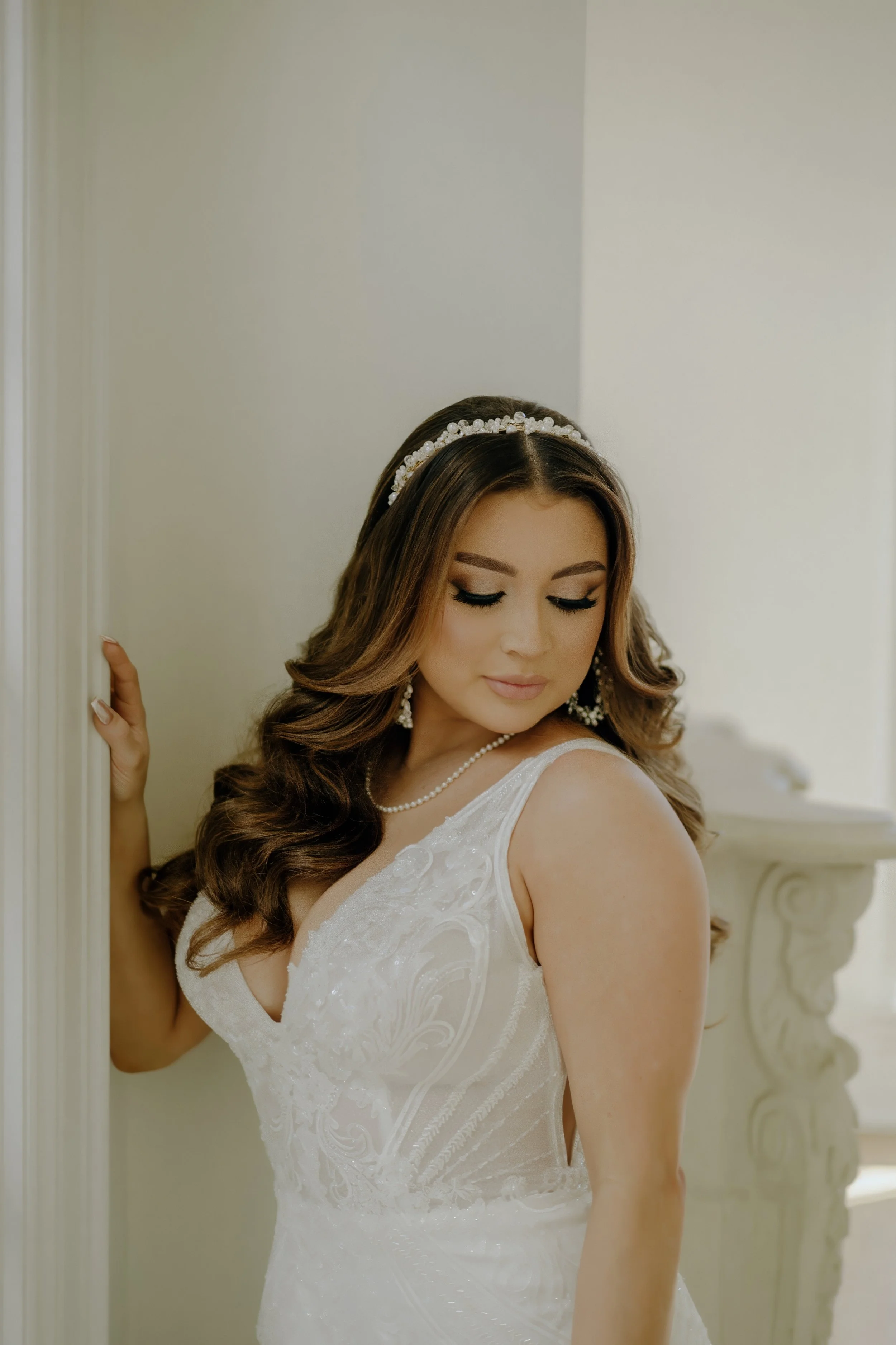 Houston & Texas Family, Couples, Newborn, Maternity, Bridal Photography – Bride gazing over shoulder in front of fireplace, Houston studio.