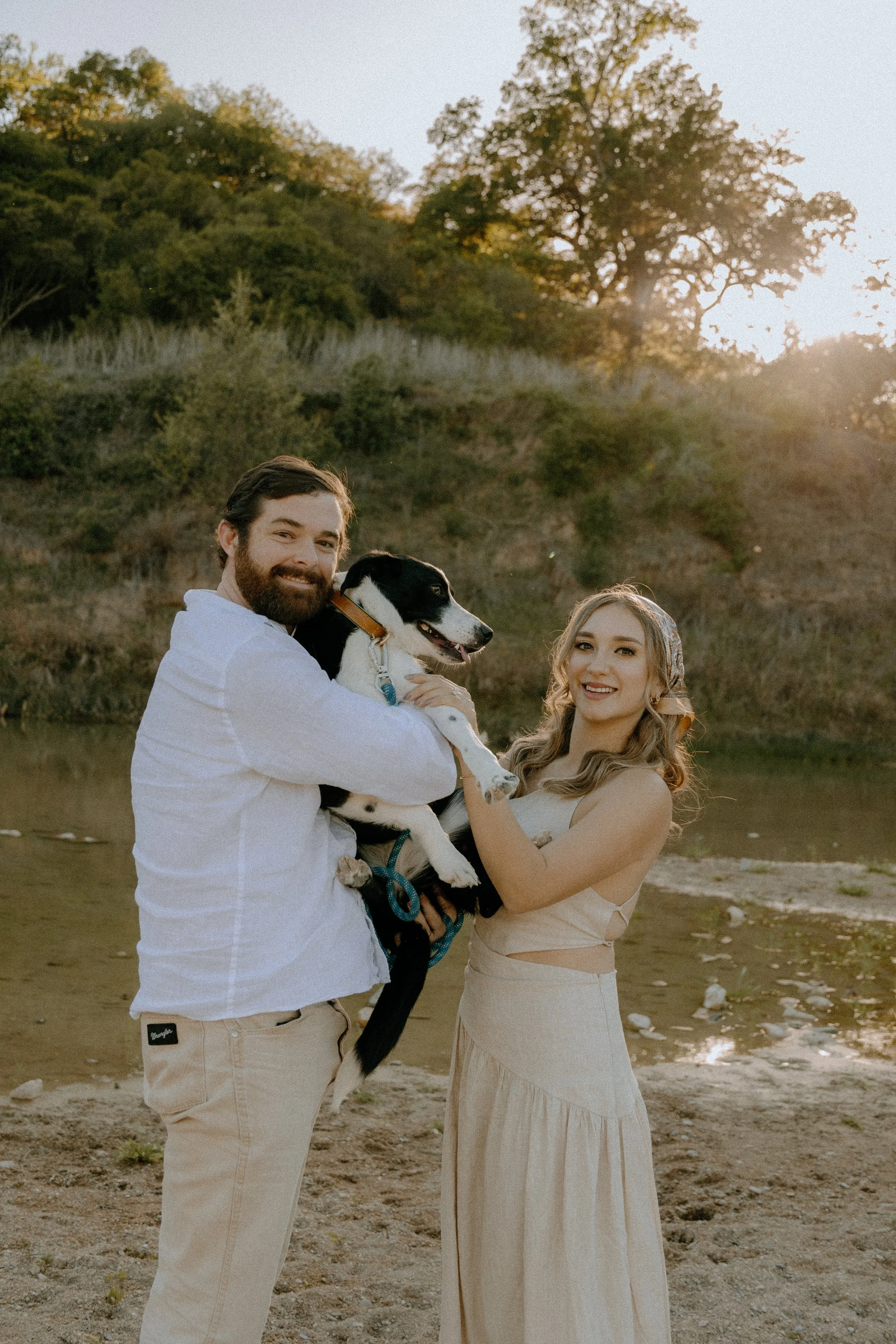 Houston & Texas Family, Couples, Newborn, Maternity, Bridal Photography – Couple holding dog during Austin TX golden hour portraits.