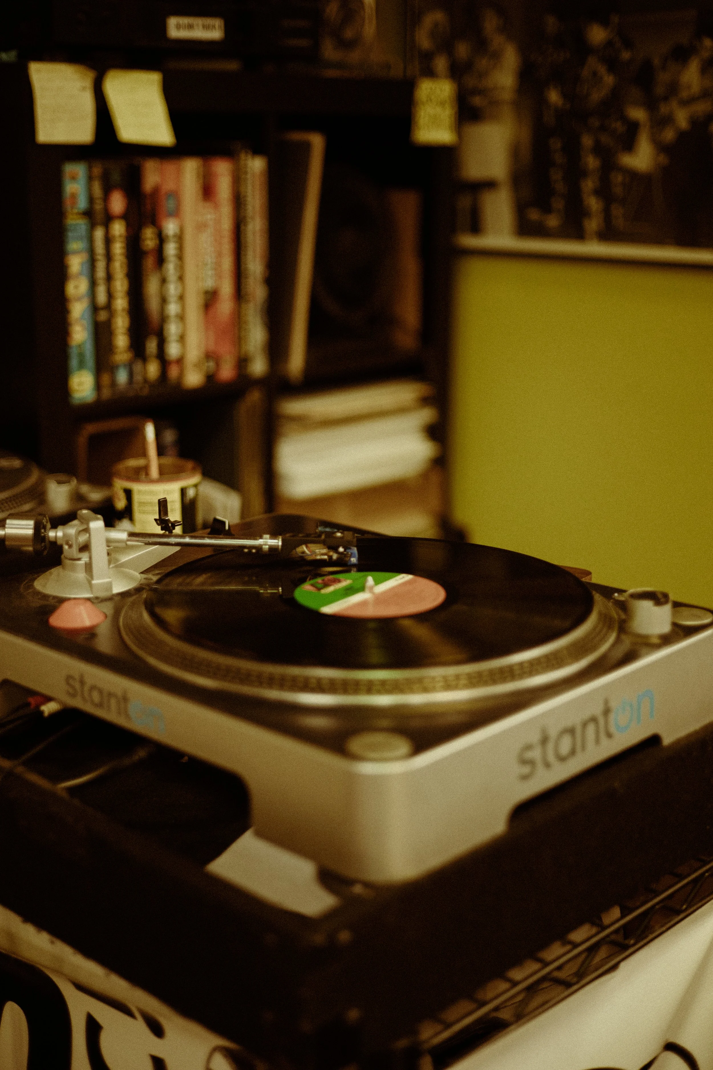 Couples Portrait Photography, Houston TX – vintage turntable spinning vinyl in Houston record shop detail shot