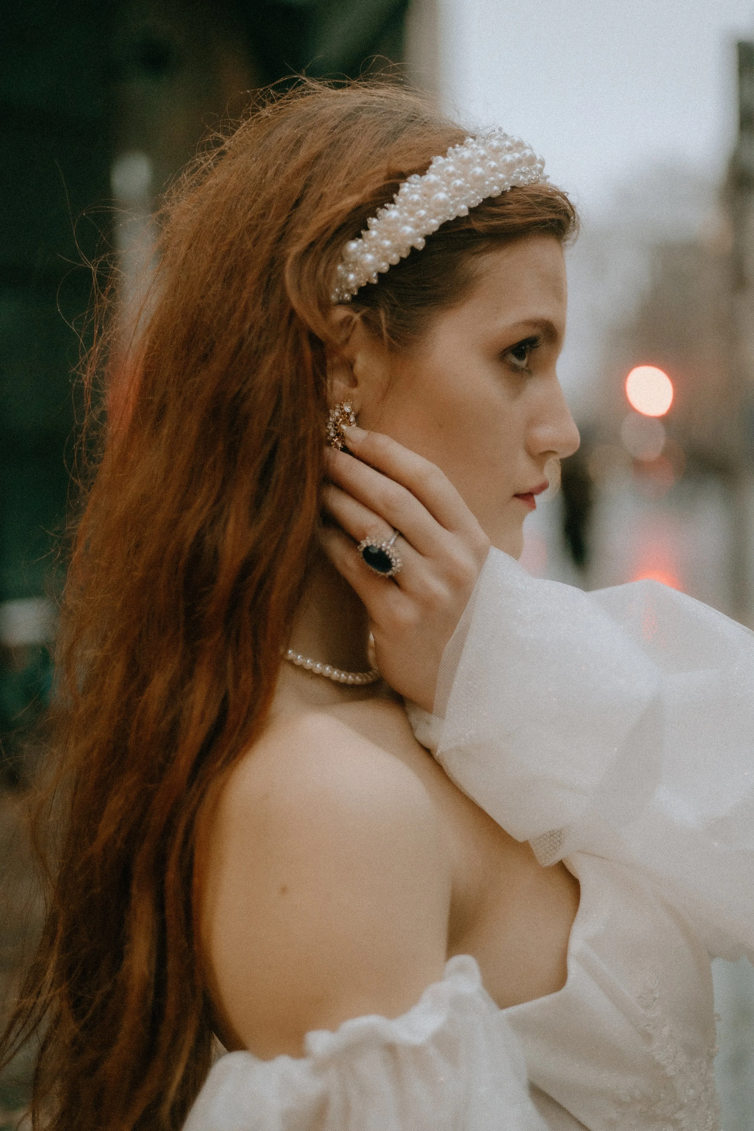 Bridal portraits – wedding &amp; engagement photography of bride in profile under soft London rain with elegant styling